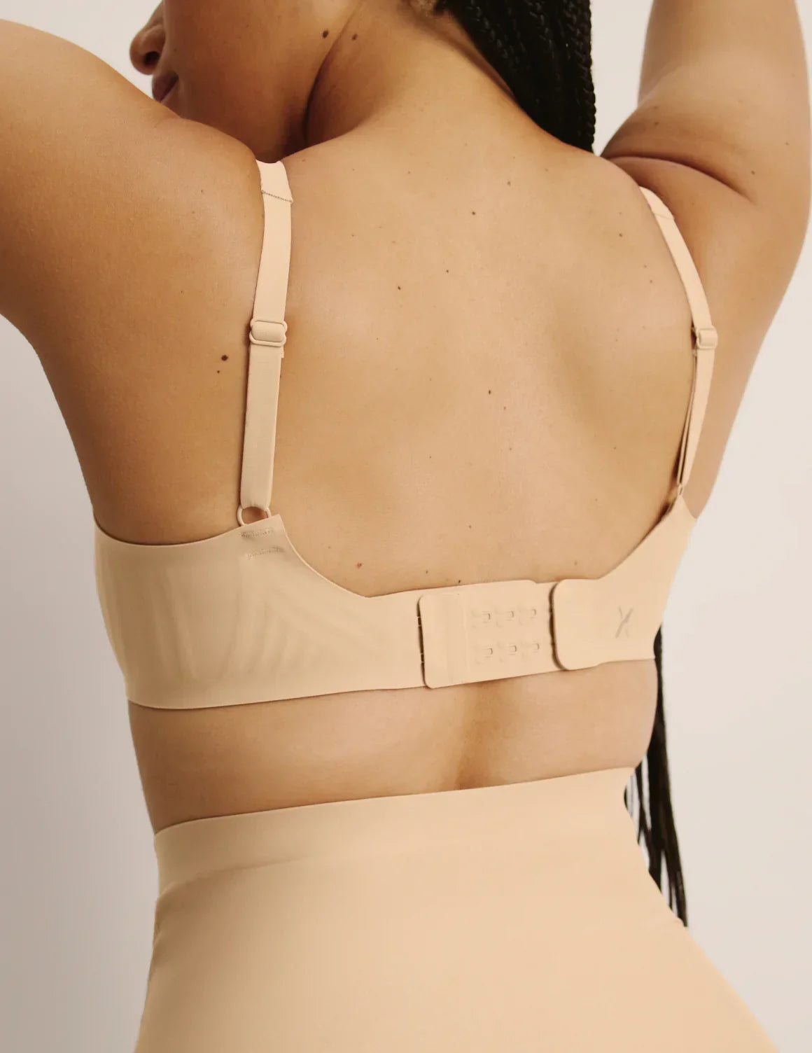Back view of model wearing the 2-Hook Band Extender – Warm Sand – view 3 of 9