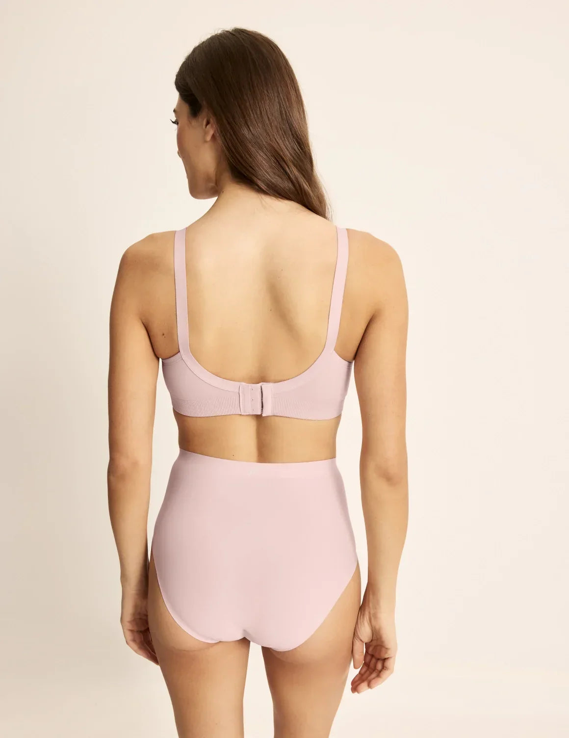 Back view of model wearing the BlissFit™ Nursing/Pumping Bra, highlighting the neckline, nursing clip strap design, and smooth silhouette – Rose Water – view 6 of 13