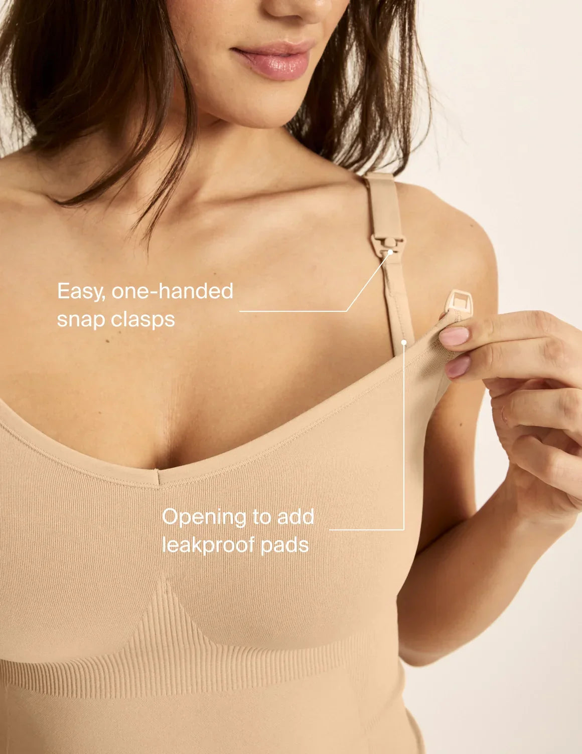 On image text: Easy, one-handed snap clasps. Opening to add leakproof pads. – view 9 of 10