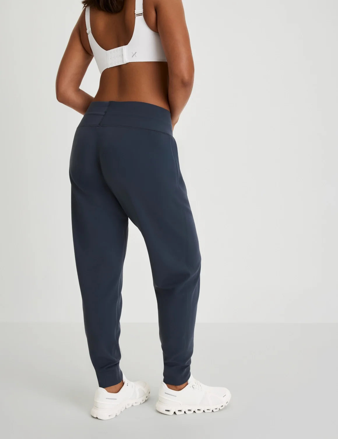 Back view of model wearing the CloudCut™ Jogger highlighting the coverage and fit – Twilight Navy – view 9 of 23