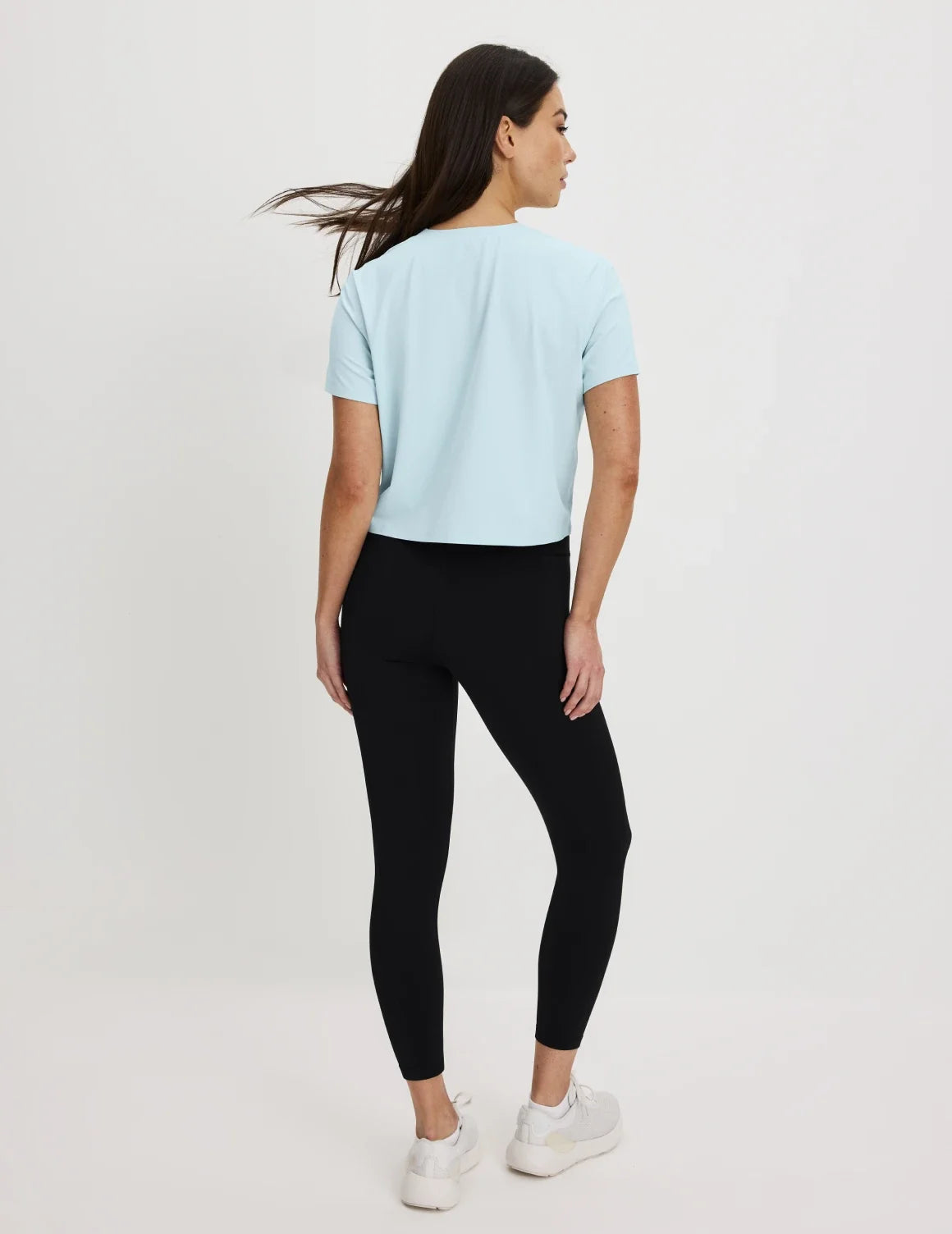 Back view of model wearing the CloudCut™ Legging highlighting the coverage and fit – Black – view 3 of 14