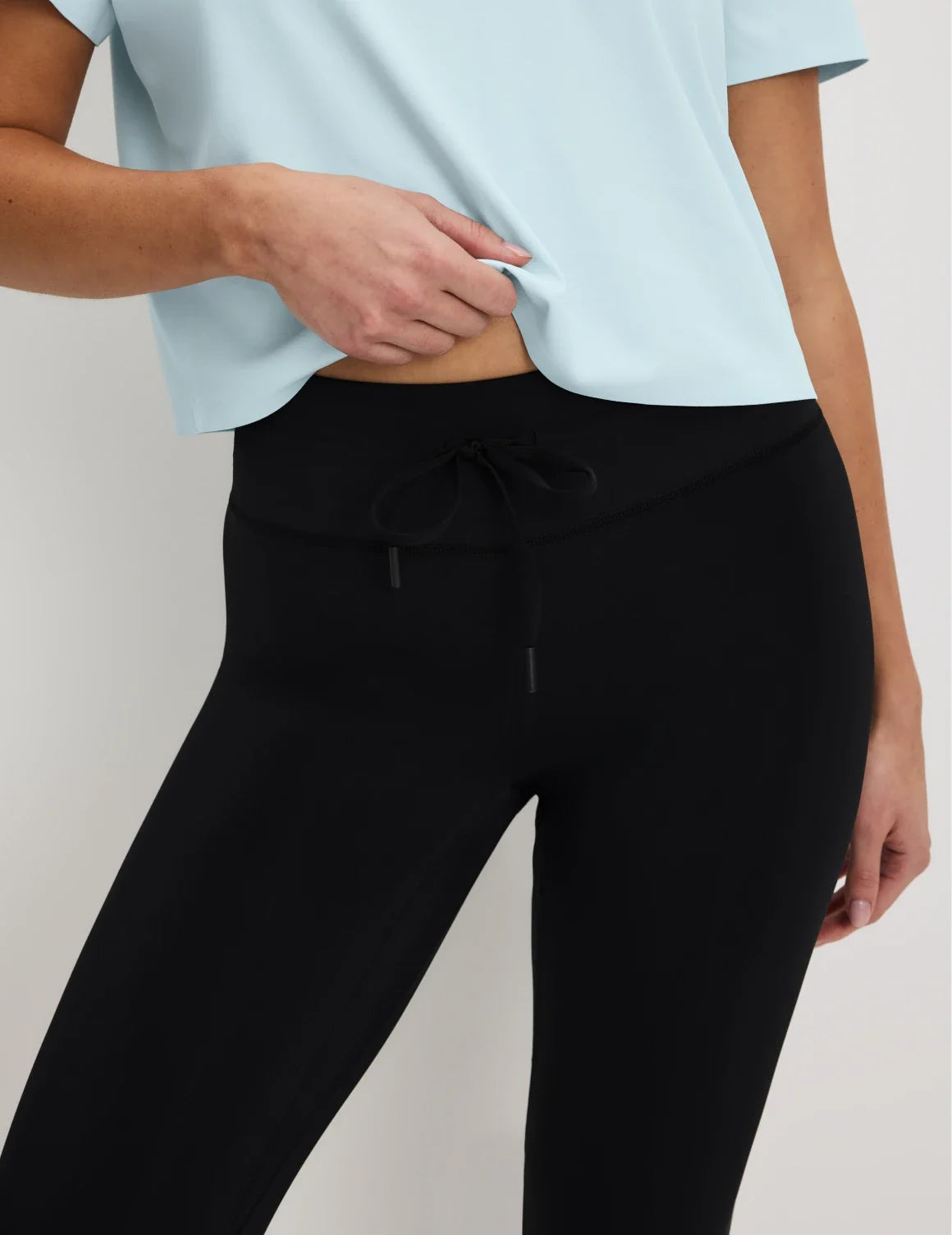 Front view of model wearing the CloudCut™ Legging highlighting the coverage and fit – Black – view 12 of 14