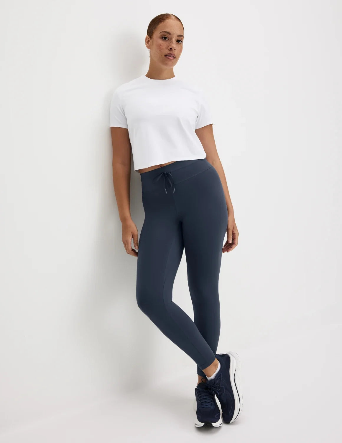 Front view of model wearing the CloudCut™ Legging highlighting the coverage and fit – Twilight Navy – view 8 of 14