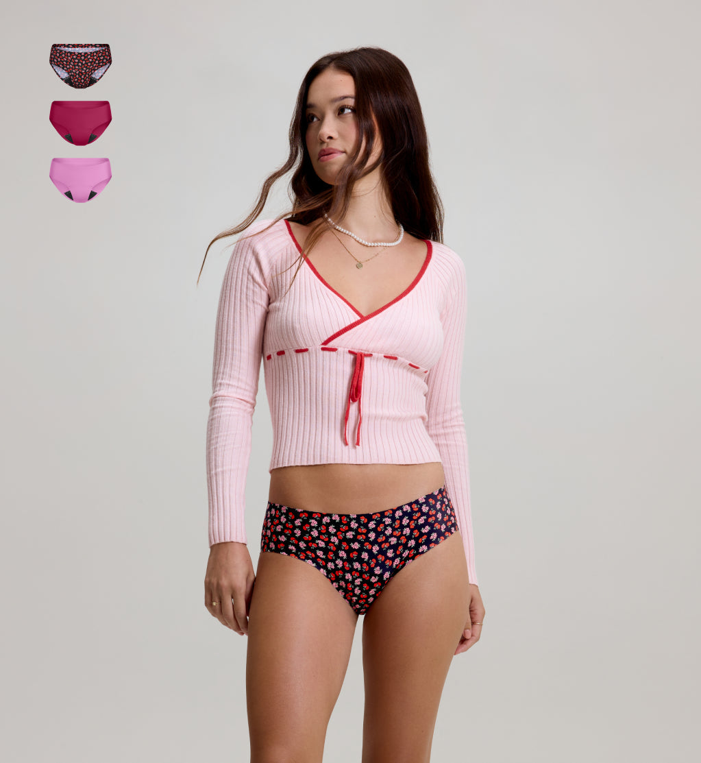 Front view of model wearing the Teen Leakproof UltraThin No-Show Bikini highlighting the coverage and smooth fit – Ruby/Sugar Plum/Posy – view 7 of 70