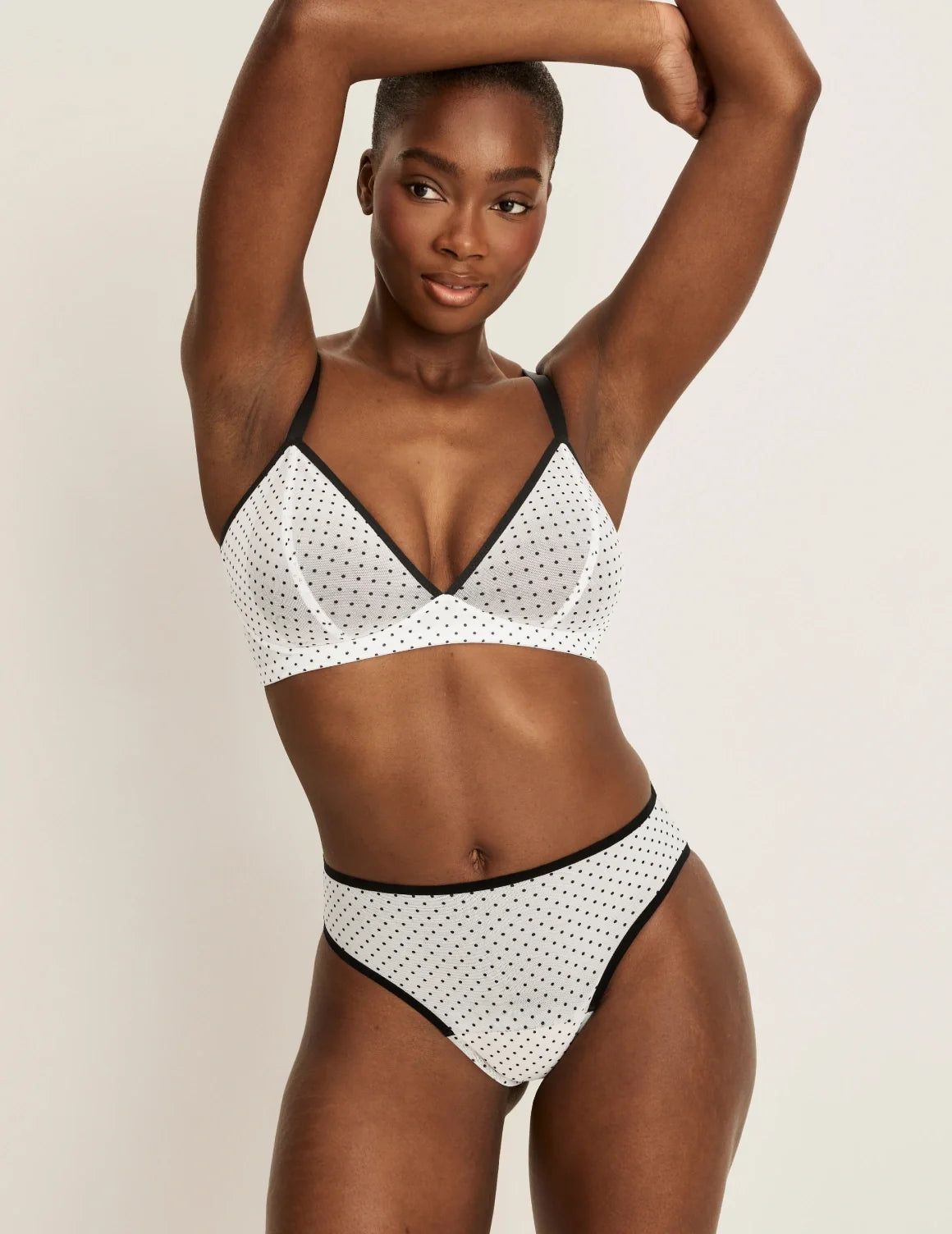 Full-body view of model wearing the Essential Full Mesh French Cut highlighting the coverage and smooth fit – White with Black Polka Dot – view 4 of 13