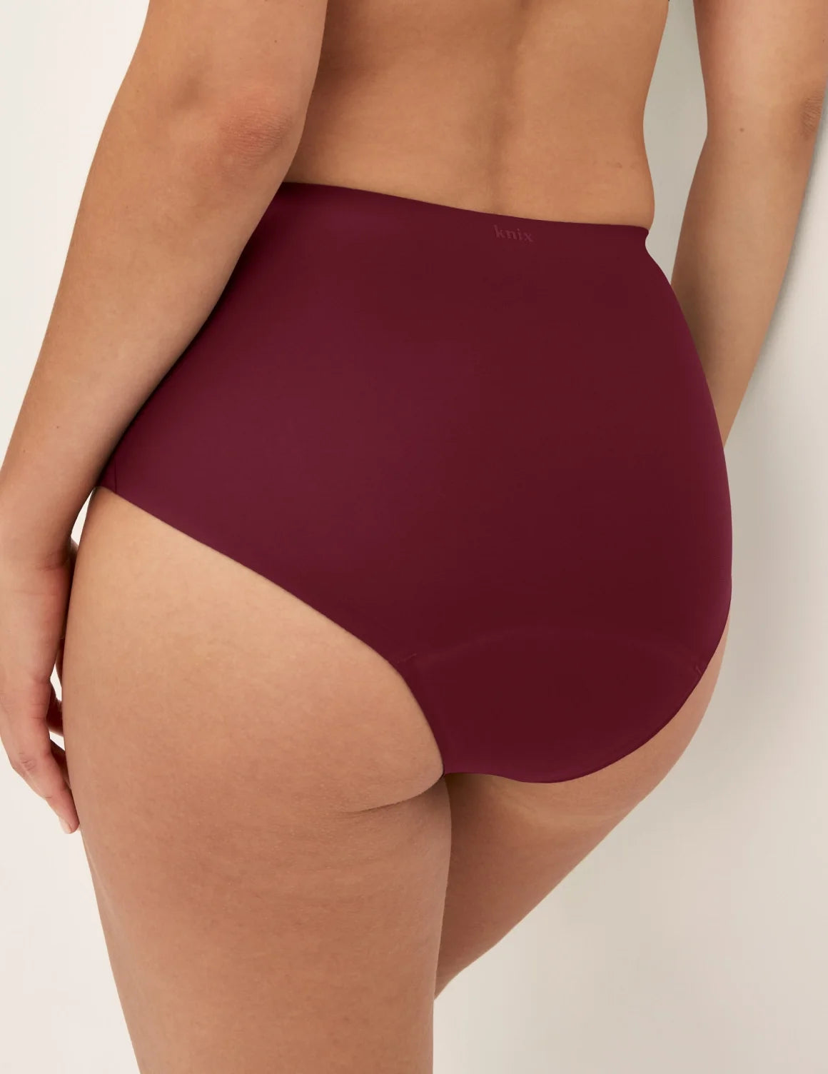 Back view of model wearing the Essential No-Show High Rise highlighting the coverage and smooth fit – Pink Multi – view 11 of 16