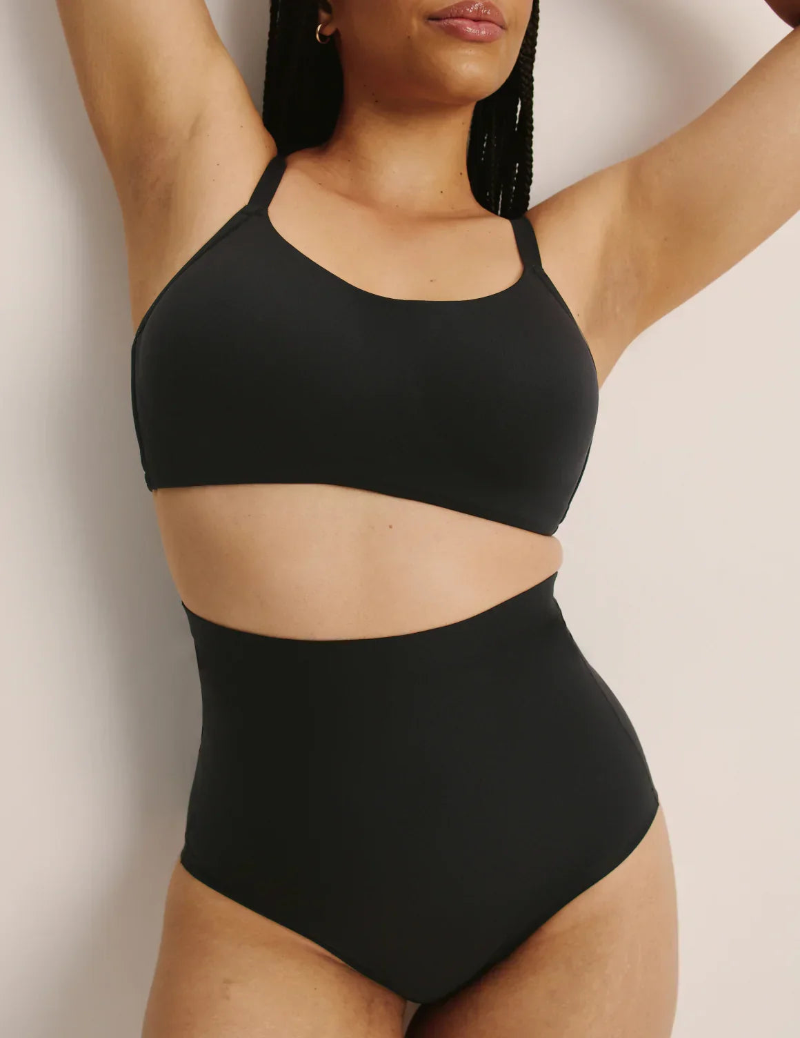Front view of model wearing the Shaper High Rise Briefs, highlighting the coverage and smooth fit – Black – view 10 of 12