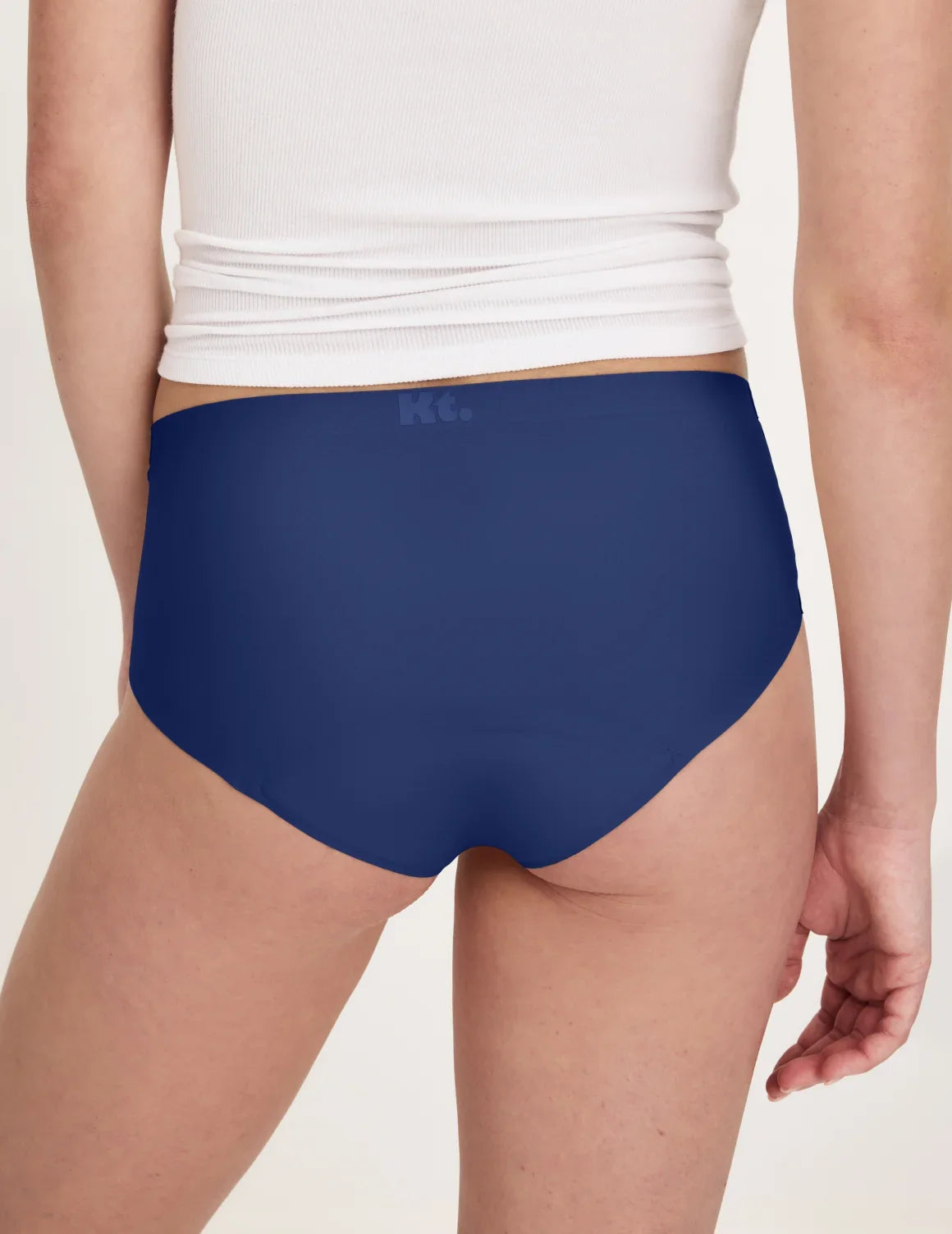 Back view of model wearing the Teen Super Leakproof® No-Show Boyshort highlighting the coverage and smooth fit – Night Sky – view 8 of 48