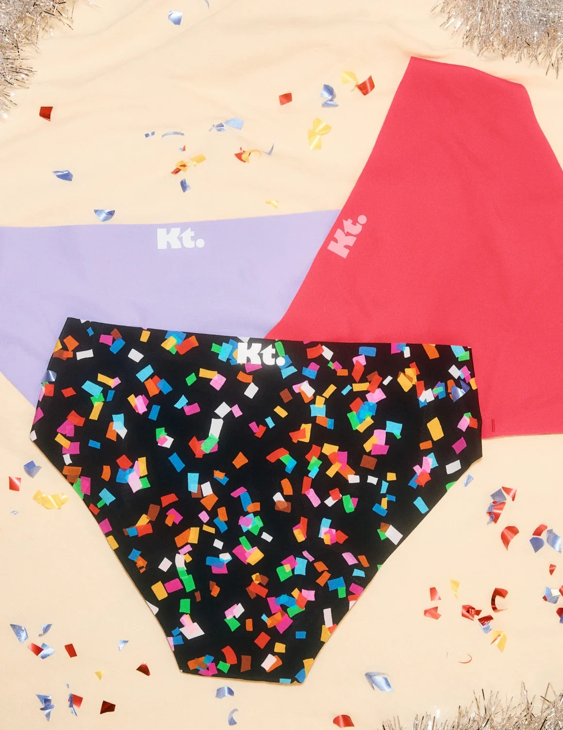 Teen Leakproof UltraThin Bikini shown front-facing against a confetti background – Confetti/Ultra Violet/Raspberry – view 11 of 19