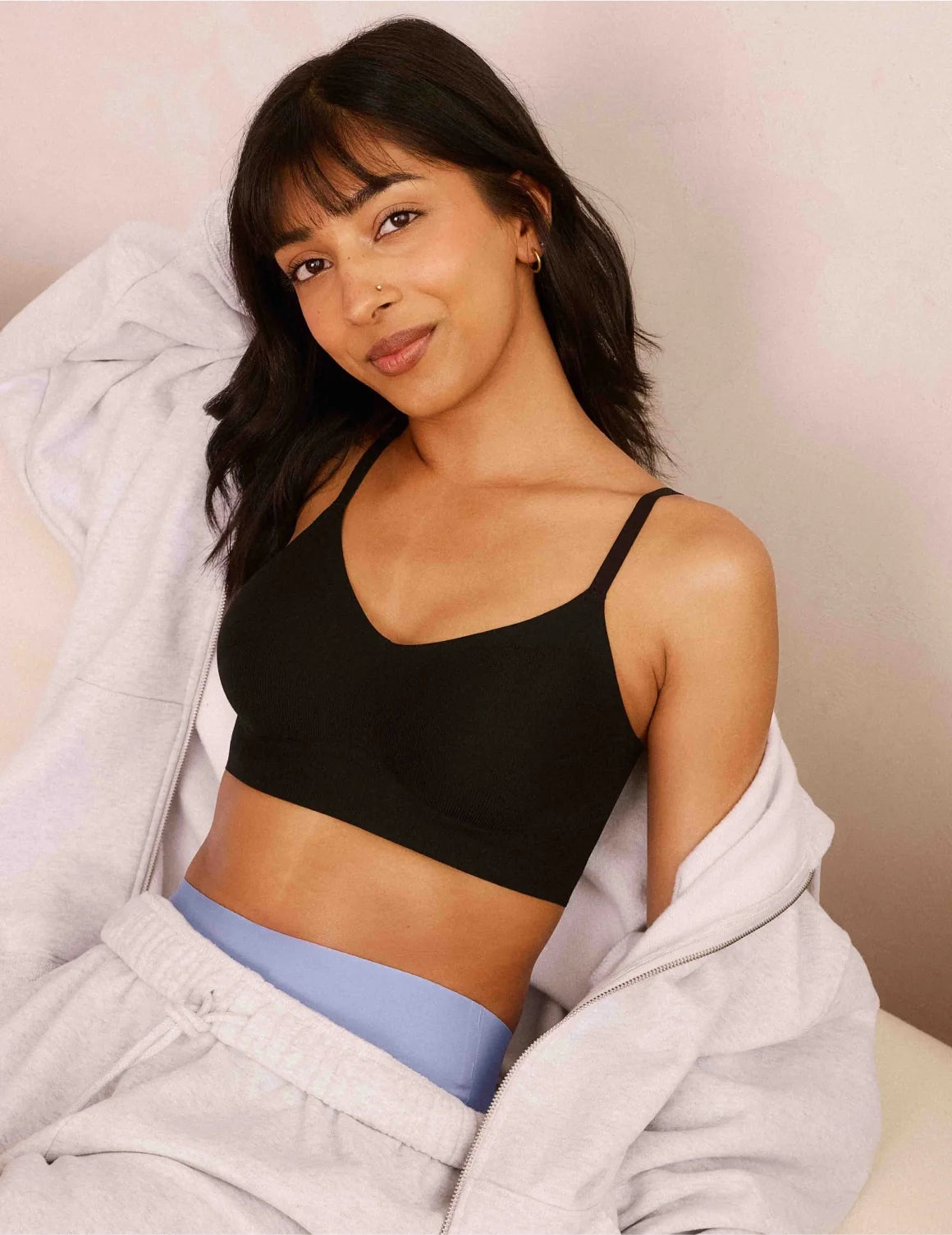 Front view of model wearing the Teen On-The-Daily Bra, highlighting the neckline, pullover design, and silhouette – Black – view 1 of 16