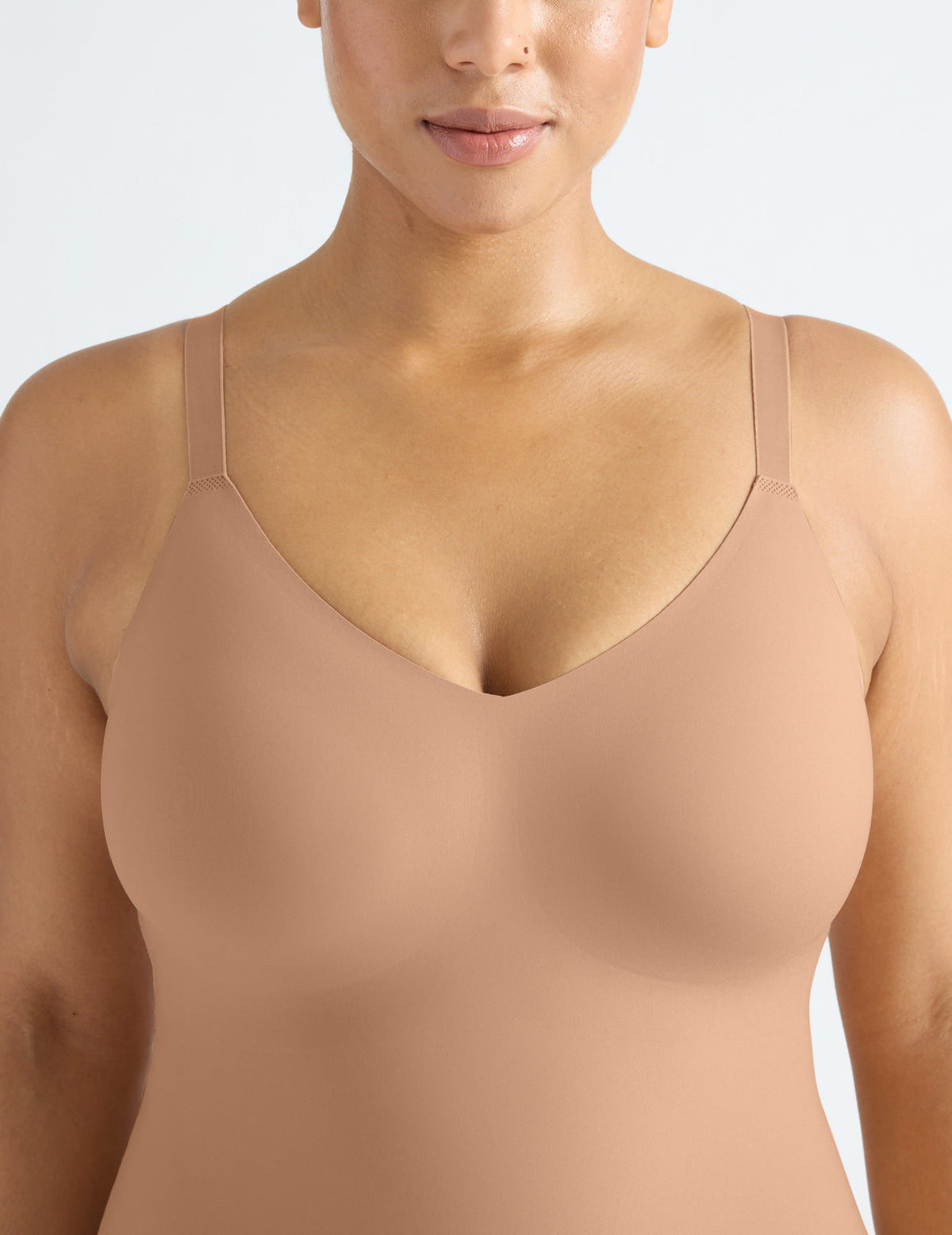 Front view of model wearing the LuxeLift Bodysuit highlighting the neckline, strap design and fit – Cavassa – view 10 of 16