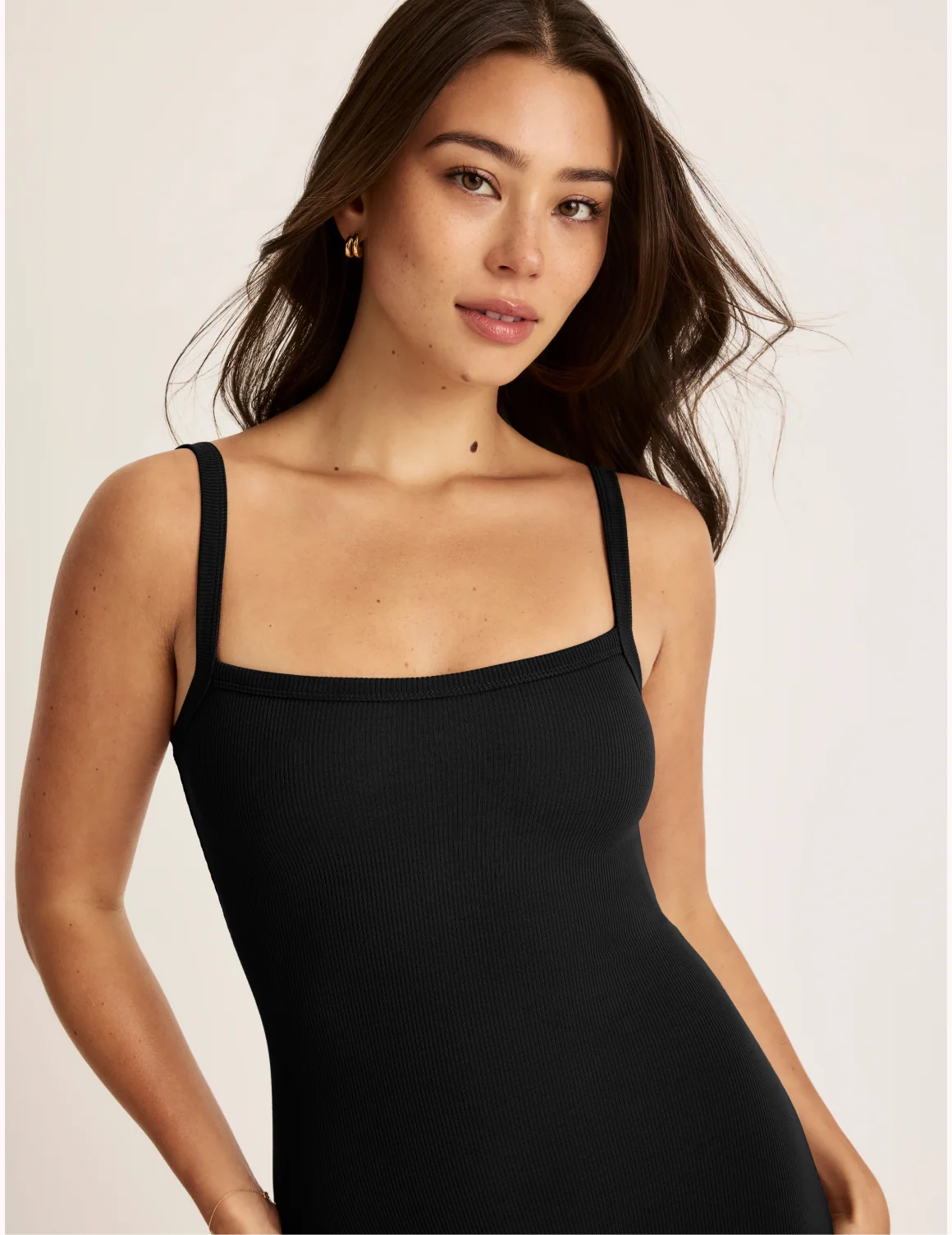 Front view of model wearing the SculptRib™ Cotton Cami Dress highlighting the neckline, fabric and hugging fit – Black – view 9 of 18
