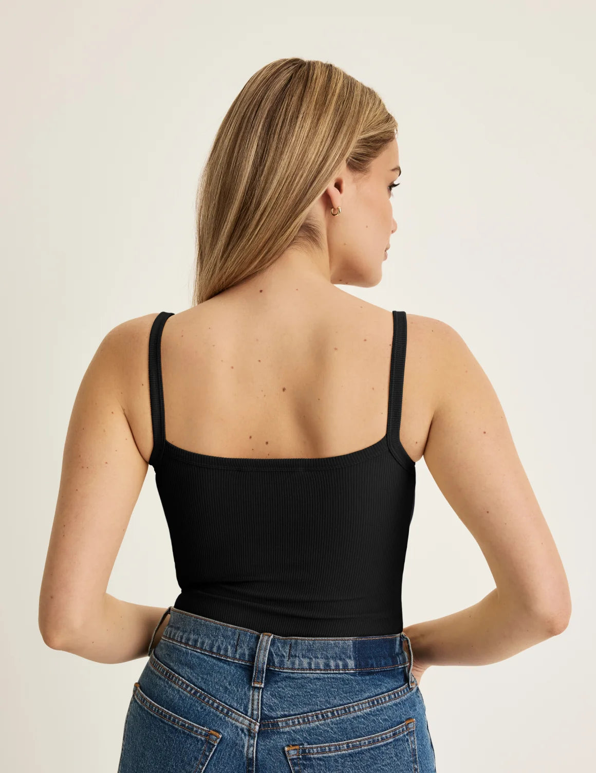 Back view of model wearing the SculptRib™ Cotton Cami highlighting the neckline, fabric and hugging fit – Black – view 7 of 22
