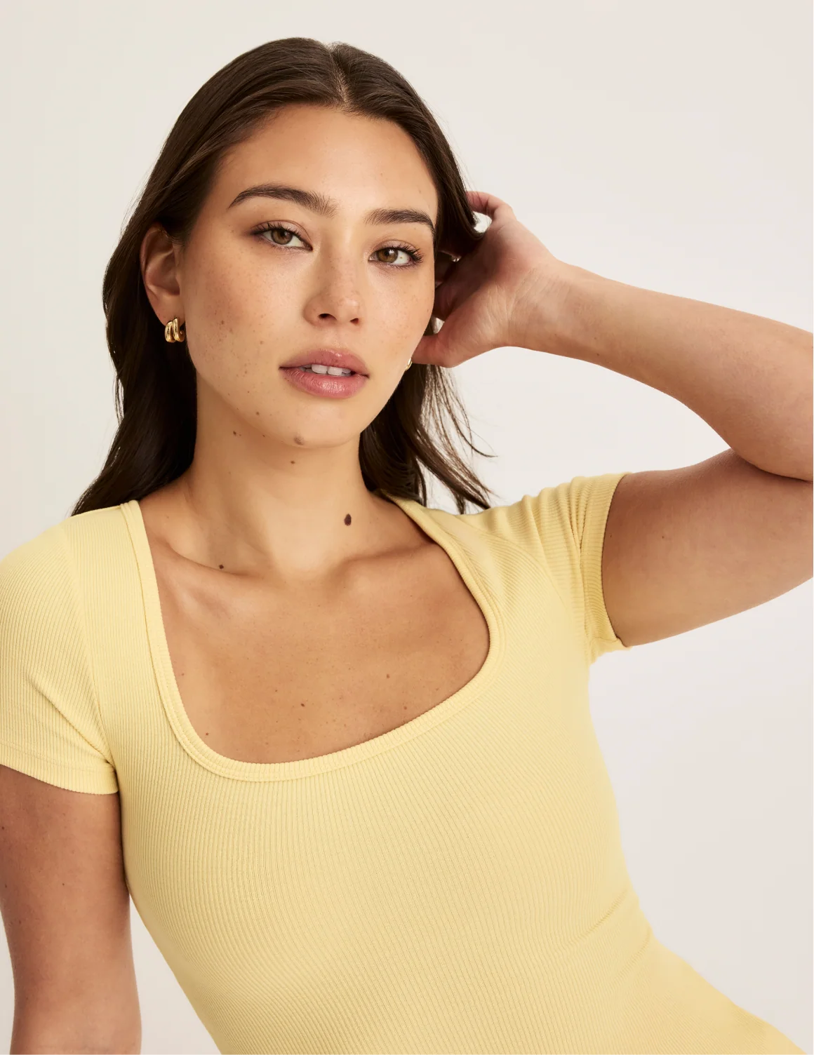 Front view of model wearing the SculptRib™ Cotton Scoop Neck T-Shirt highlighting the neckline, fabric and hugging fit – Buttercup – view 8 of 21
