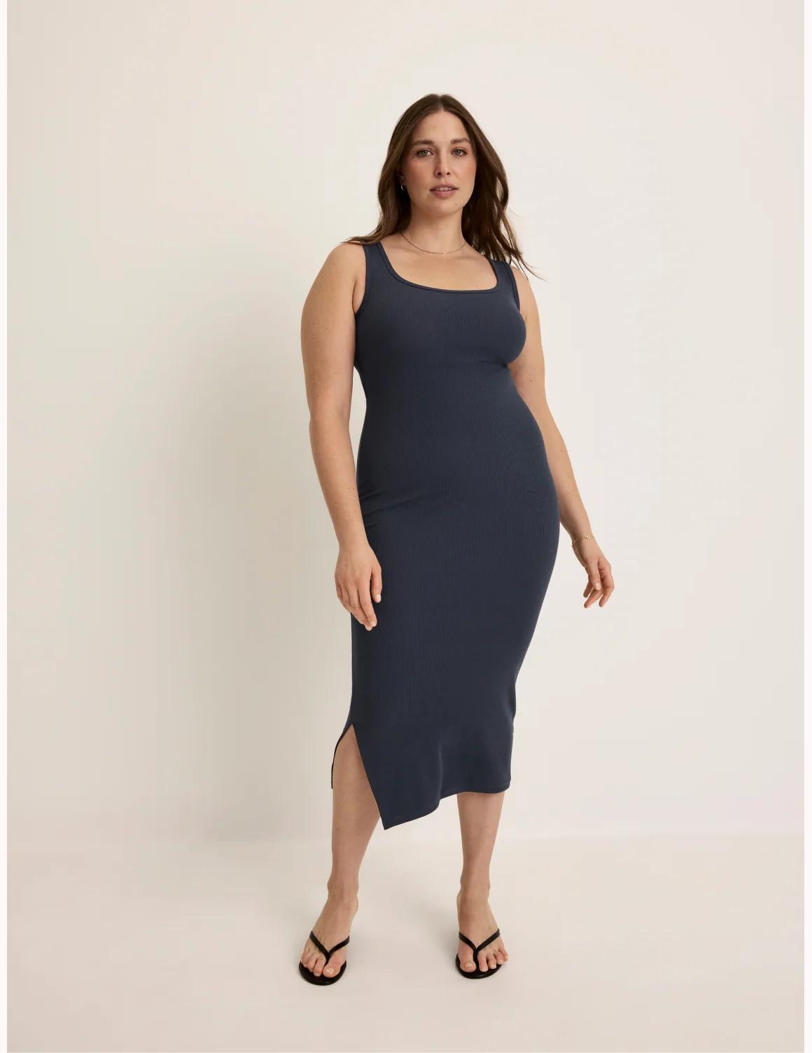 Front view of model wearing the SculptRib™ Cotton Tank Dress highlighting the neckline, hemline and hugging fit – Twilight Navy – view 10 of 19