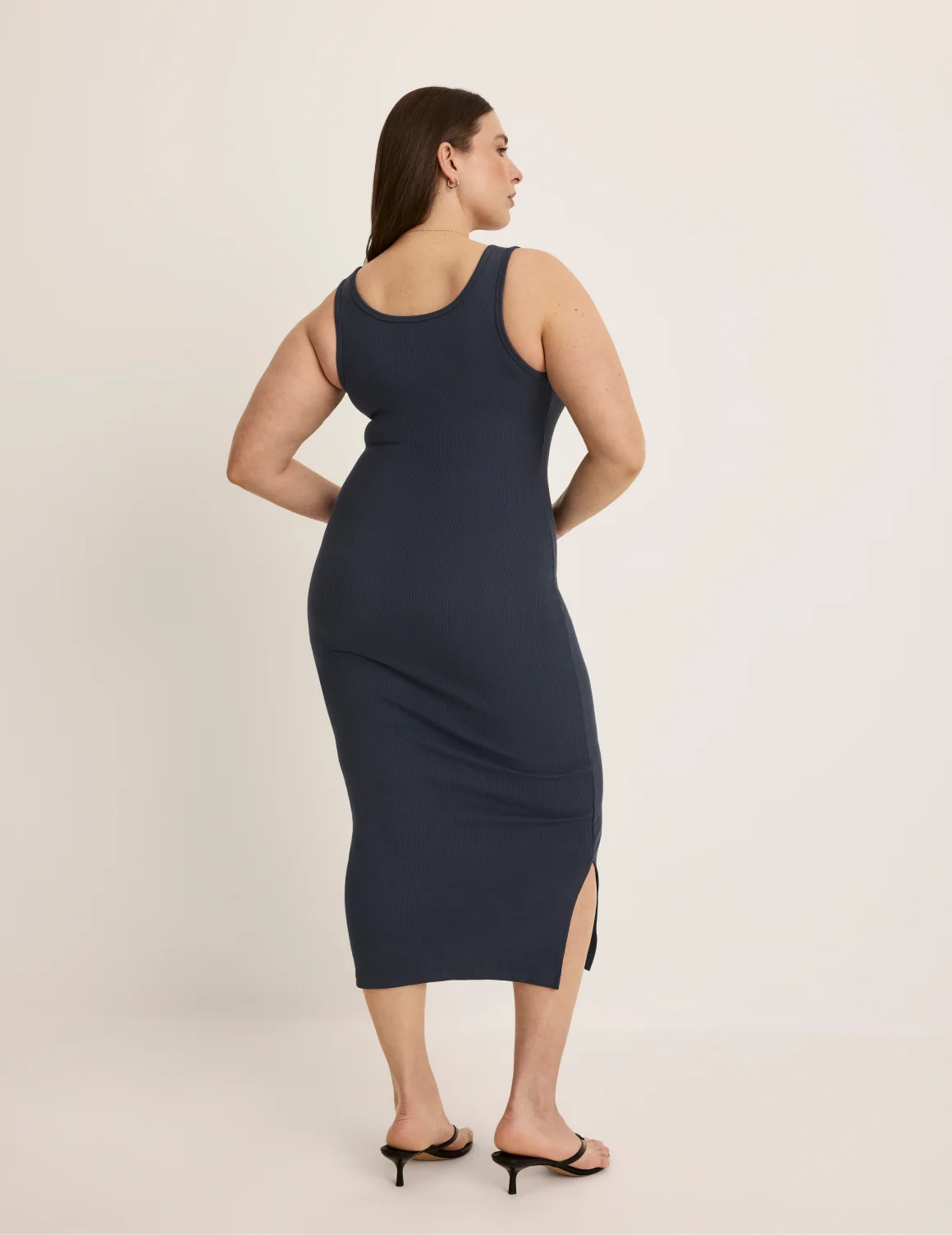 Back view of model wearing the SculptRib™ Cotton Tank Dress highlighting the neckline, hemline and hugging fit – Twilight Navy – view 12 of 19