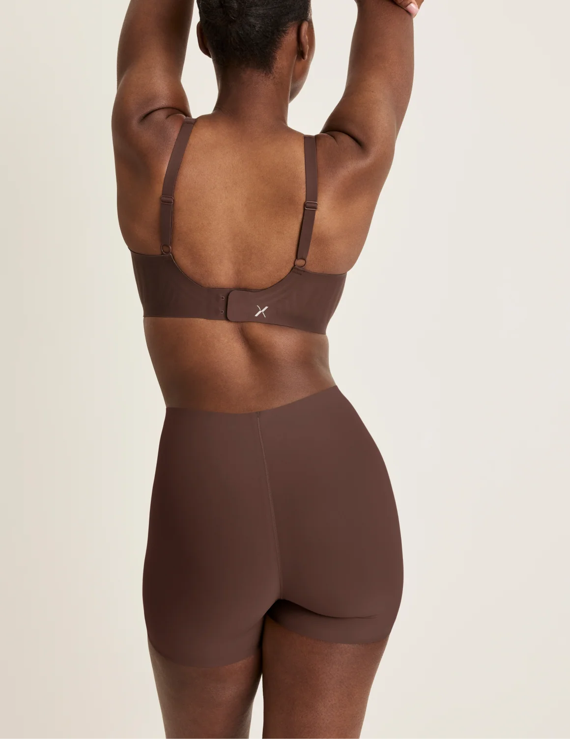 Back view of model wearing the Shortie Thigh Saver® 4”, highlighting the coverage and smooth fit – Sable – view 9 of 25
