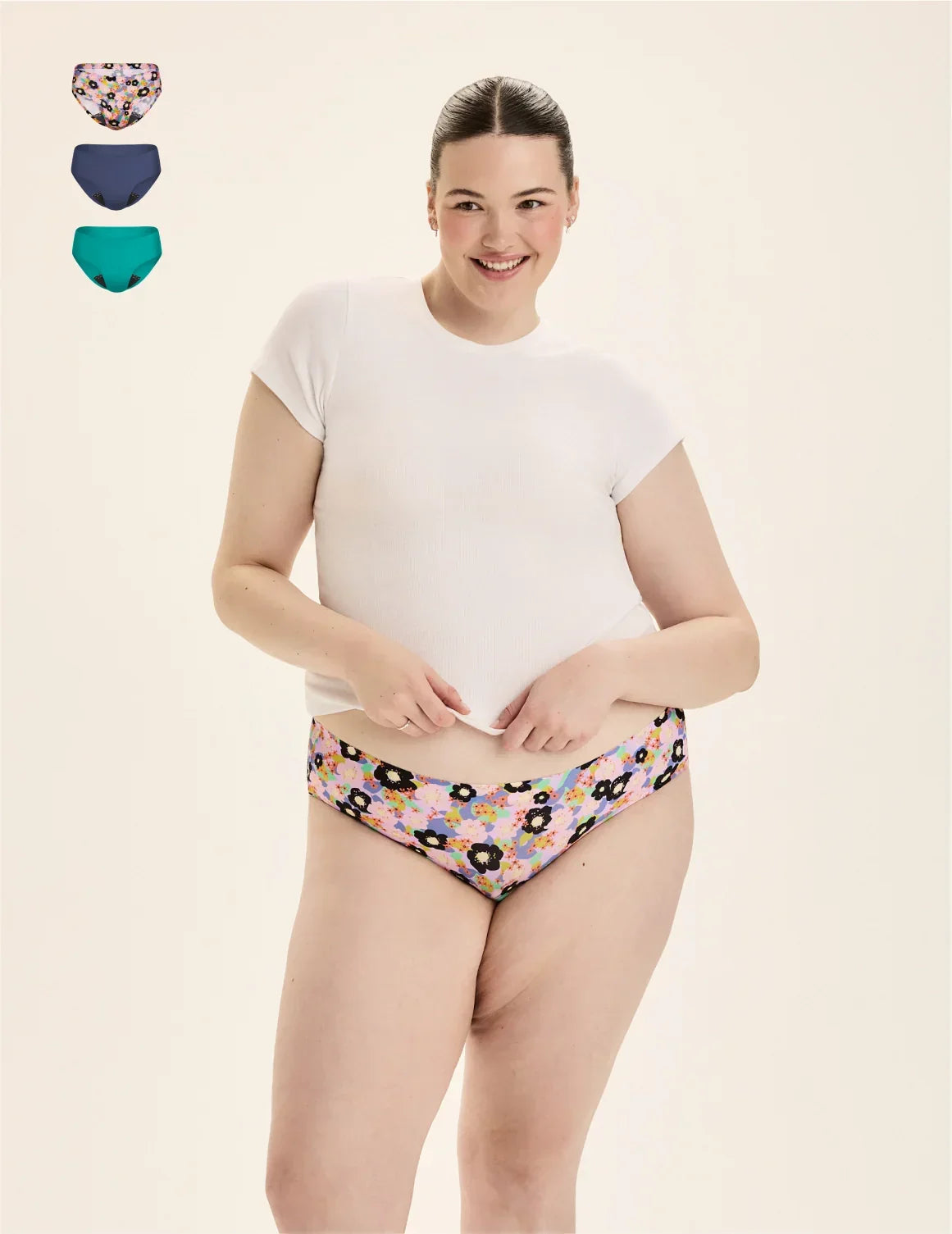 Front view of model wearing the Teen Leakproof UltraThin No-Show Bikini highlighting the coverage and smooth fit – Electric Orchid/Teal Appeal/Lagoon – view 4 of 70