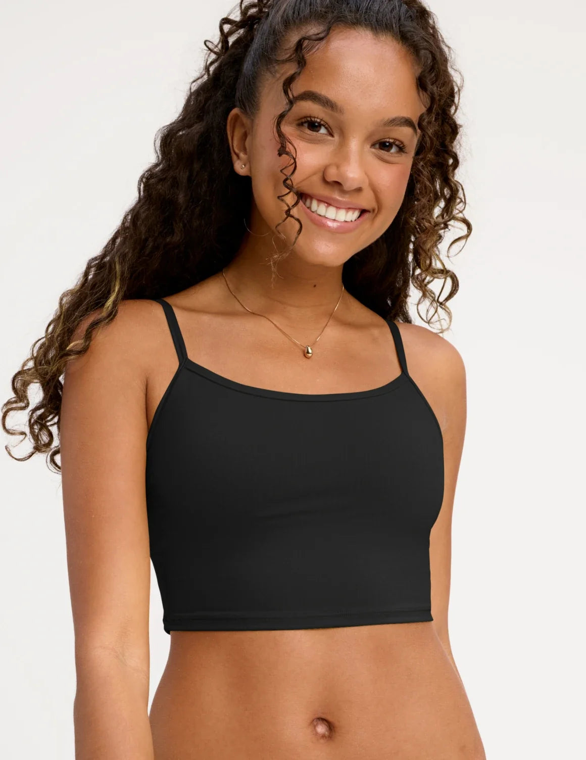 Front view of model wearing the Teen Scoop Tankini Top highlighting the coverage and fit – Black – view 3 of 16