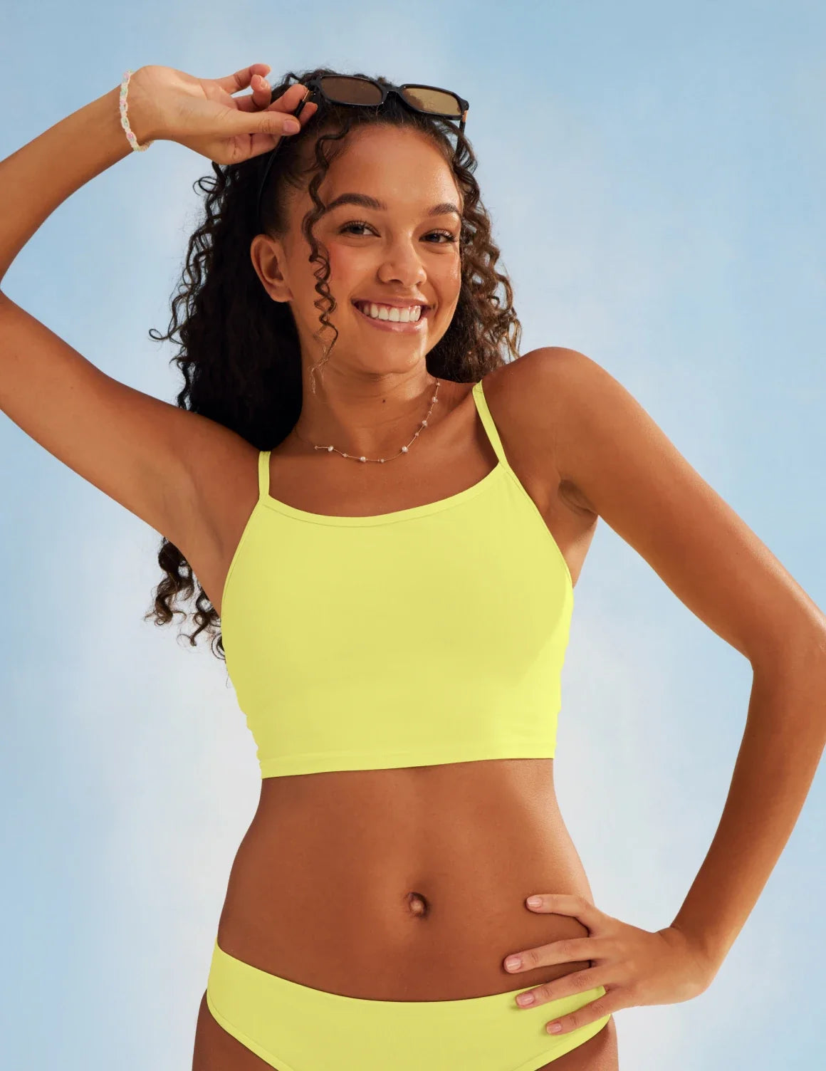 Front view of model wearing the Teen Scoop Tankini Top highlighting the coverage and fit – Lemon Drop – view 12 of 16