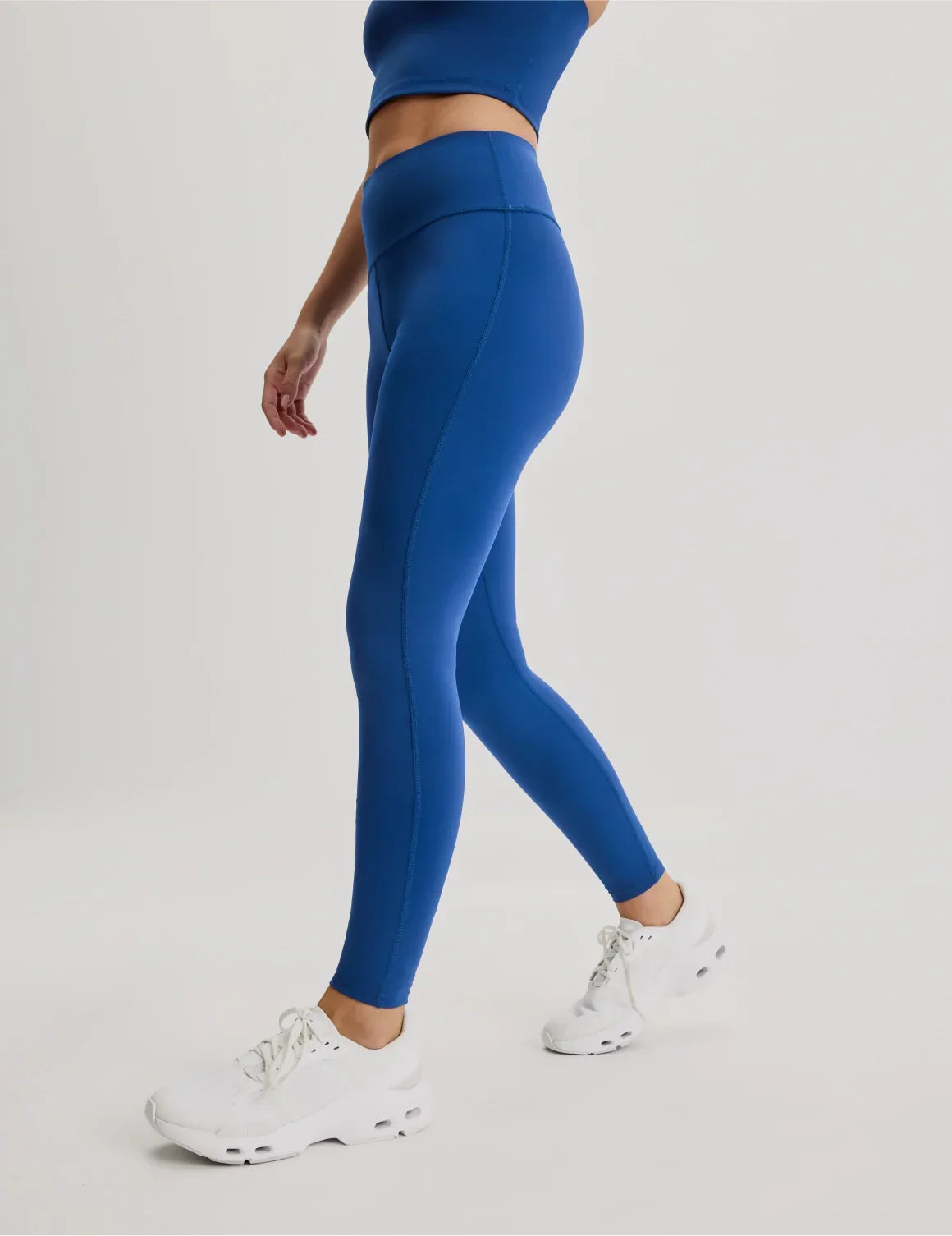 Side view of model wearing the Teen Leakproof Active Legging highlighting the coverage and fit – Shady Blue – view 3 of 12
