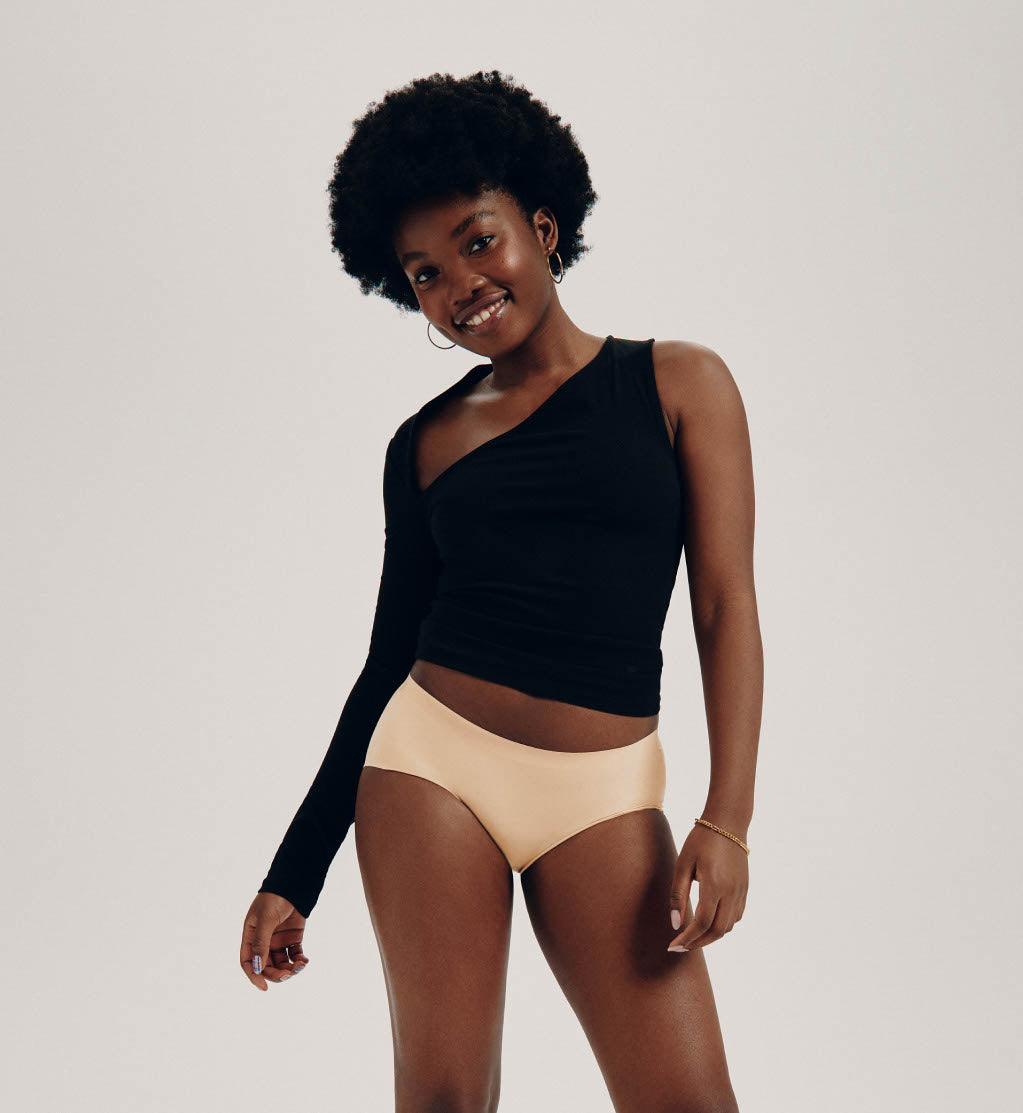 Front view of model wearing the Teen Light Leakproof No-Show Boyshort highlighting the coverage and smooth fit – Warm Sand – view 6 of 93