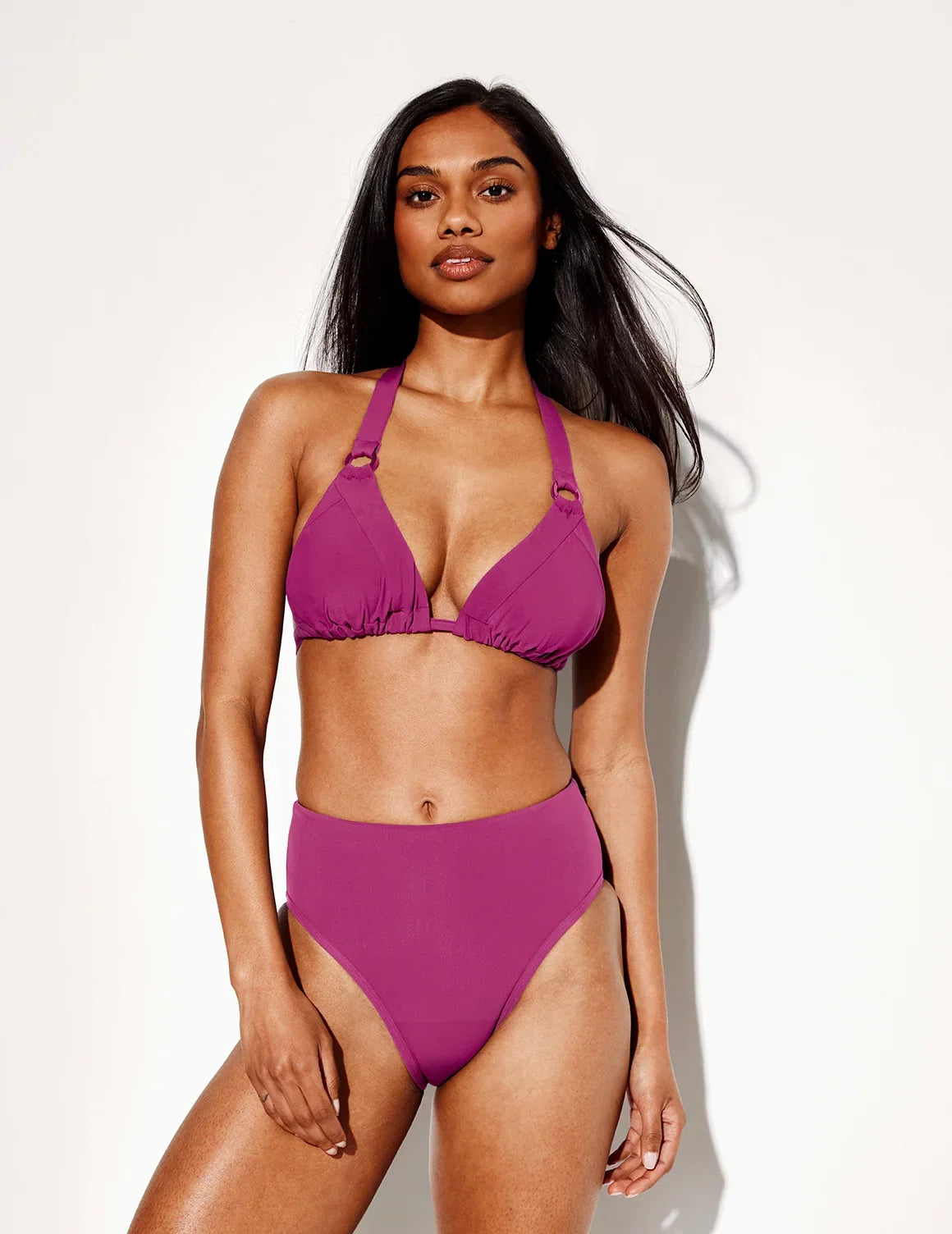 Front view of model wearing the Leakproof Sculpt High Rise Bikini Swim Bottom highlighting the coverage and fit – Deep Orchid – view 3 of 21