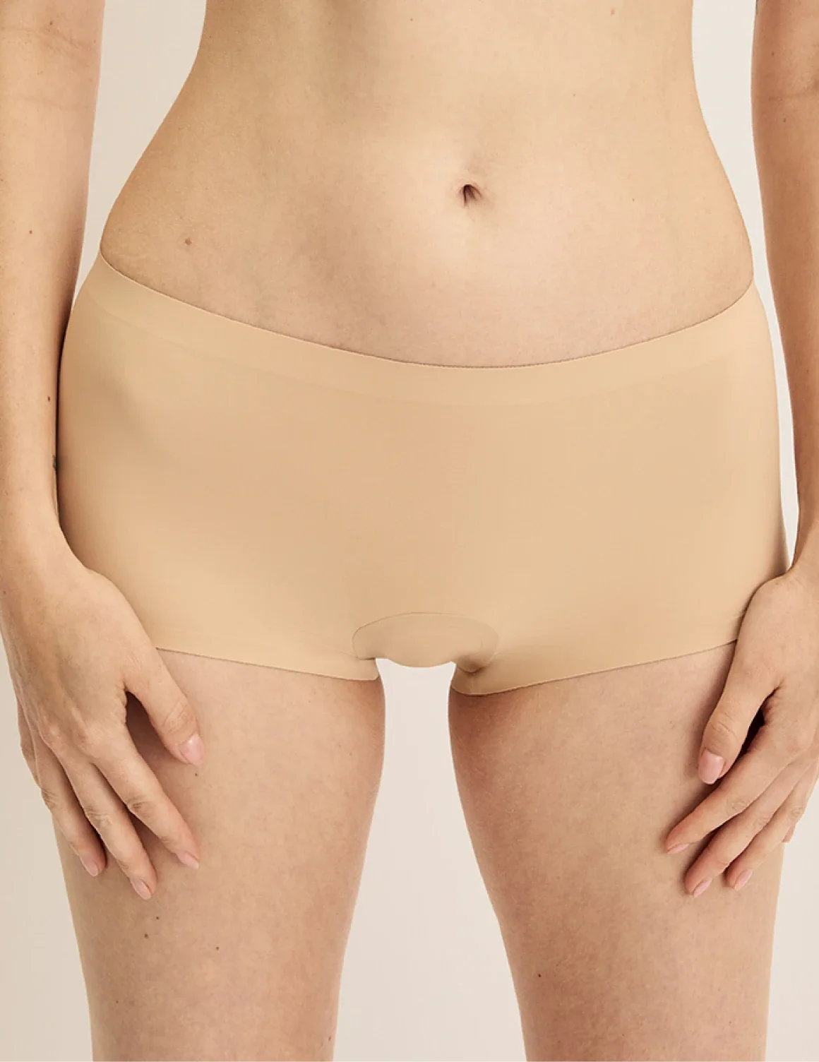 Front view of model wearing the Leakproof UltraThin No-Show Boybrief highlighting the coverage and smooth fit – Warm Sand – view 5 of 12