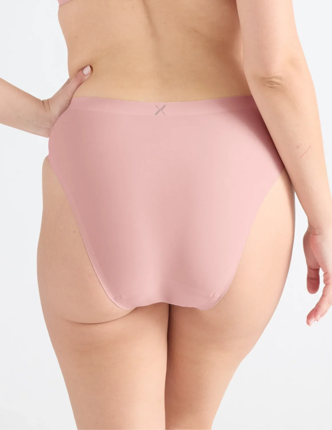 Back view of model wearing the Leakproof UltraThin No-Show French Cut highlighting the coverage and smooth fit – Rose Water – view 9 of 36