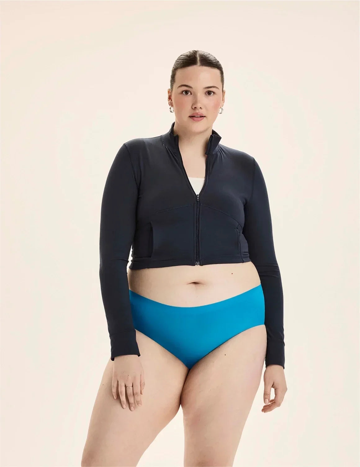 Front view of model wearing the Teen Leakproof UltraThin No-Show Boyshort highlighting the coverage and smooth fit – Marina – view 3 of 74