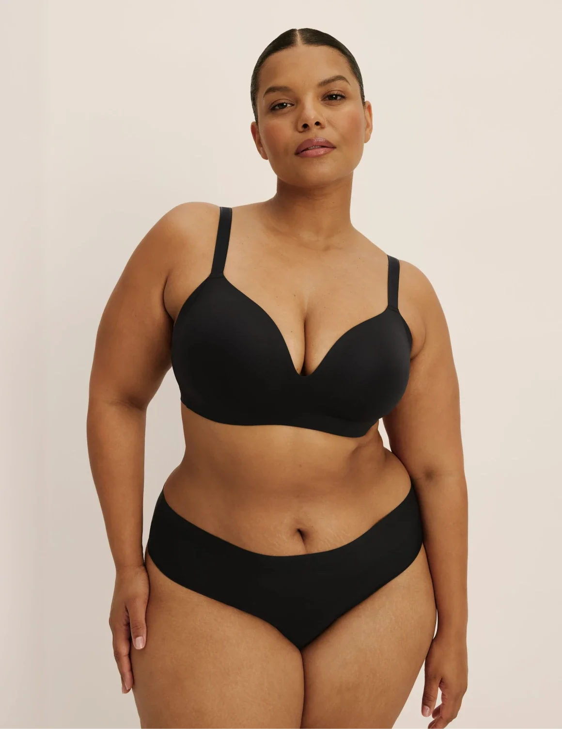 Full-body view of model wearing the Light Leakproof No-Show French Cut highlighting the coverage and smooth fit – Black – view 7 of 8