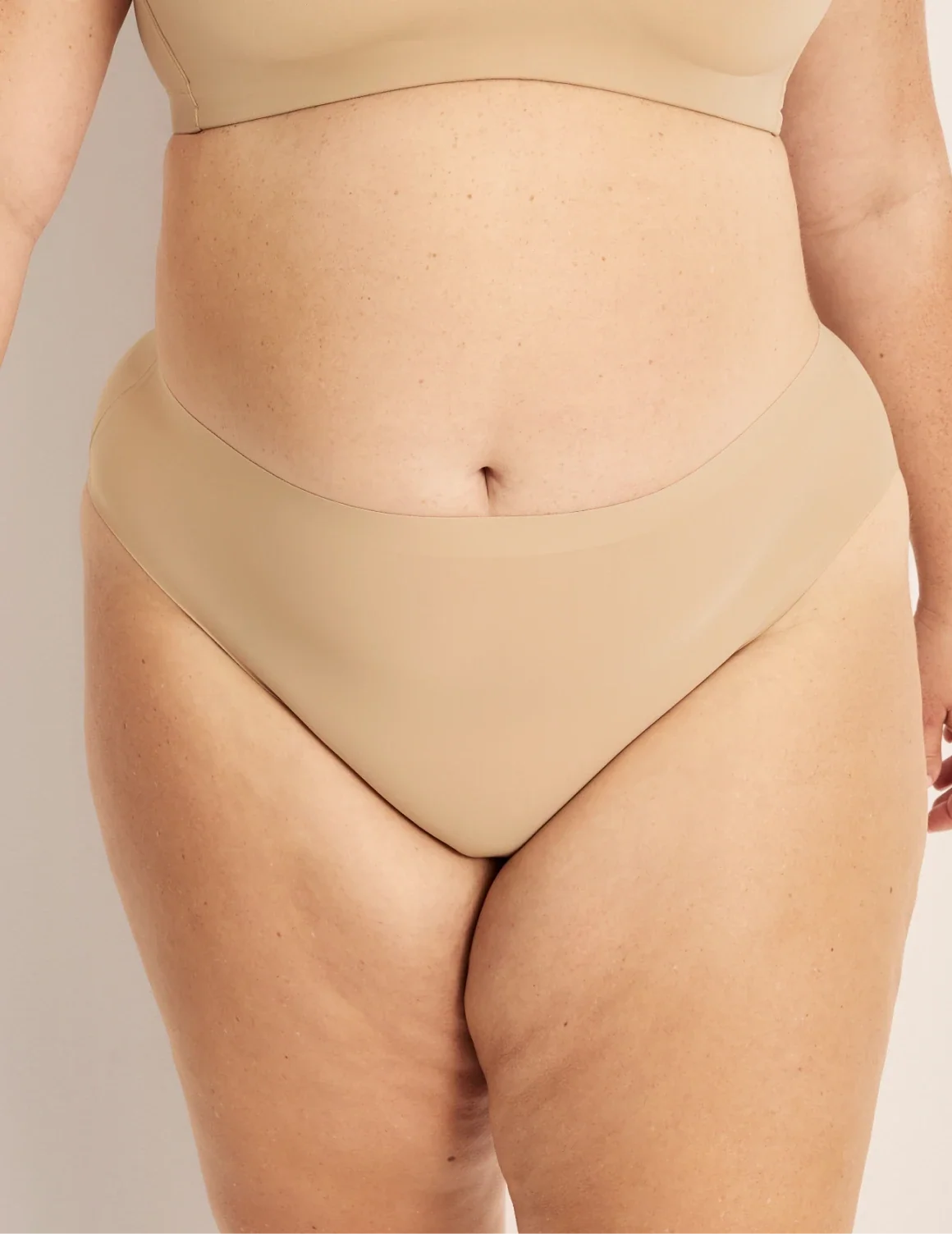 Front view of model wearing the Light Leakproof No-Show French Cut highlighting the coverage and smooth fit – Warm Sand – view 4 of 8