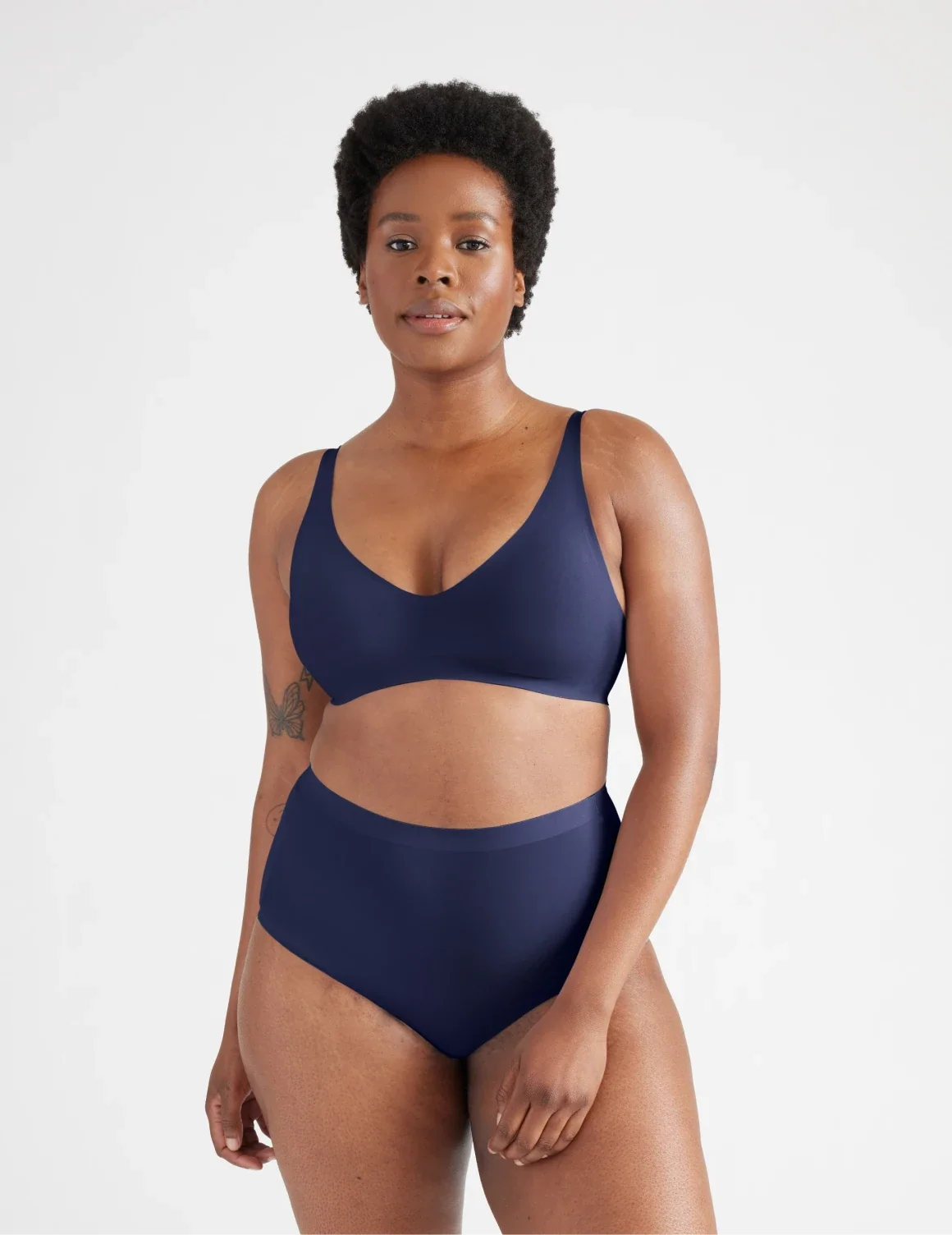 Full-body view of model wearing the Light Leakproof No-Show High Rise highlighting the coverage and smooth fit – Midnight – view 8 of 20