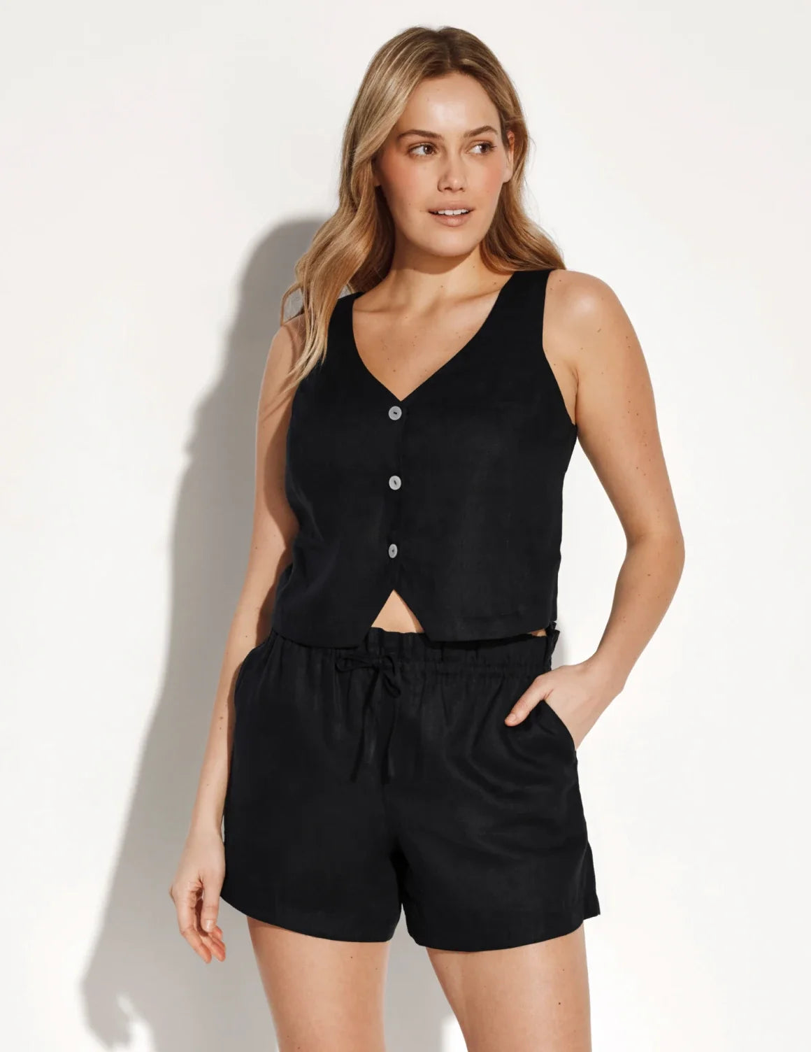Front view of model wearing the Linen Poolside Tank highlighting the coverage and fit – Black – view 4 of 13