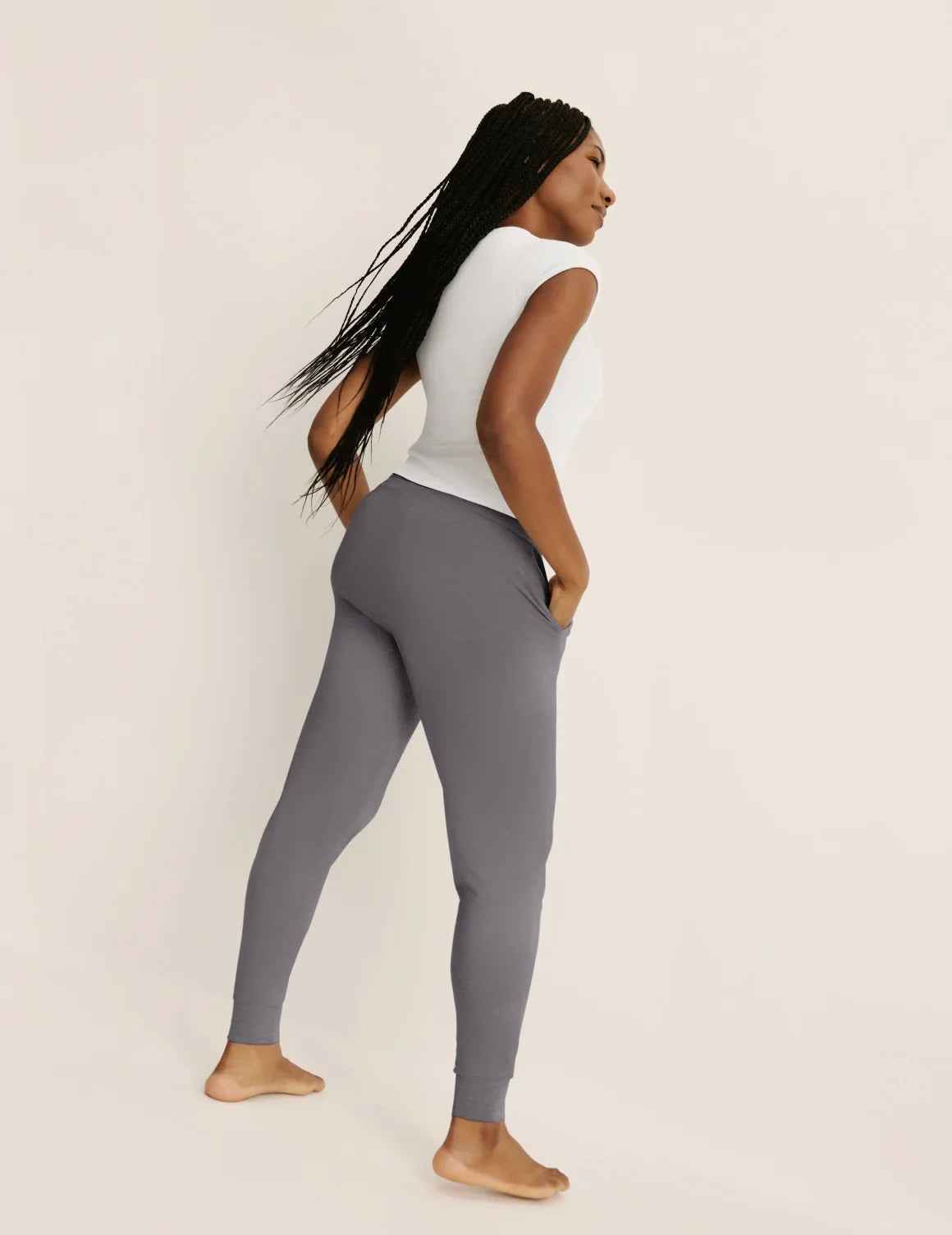Back view of model wearing the Modal Jogger highlighting the coverage and fit – Titanium – view 8 of 17
