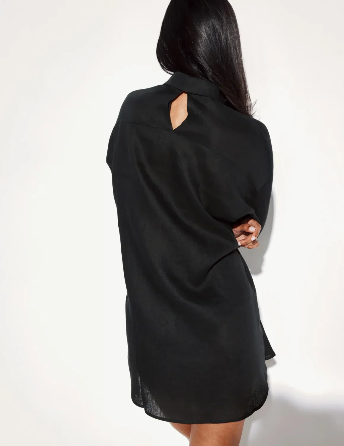 Back view of model wearing the Linen Beach Shirt highlighting the coverage and fit – Black – view 5 of 16
