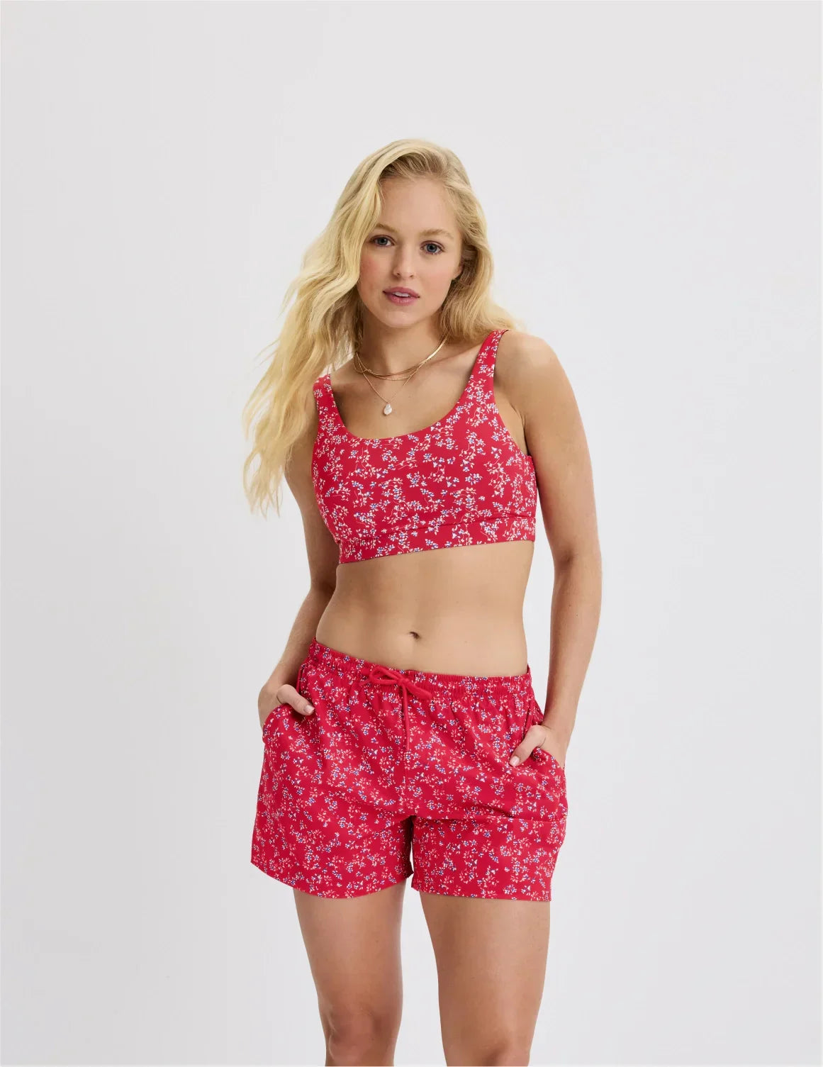 Front view of model wearing the Teen Period Swim Board Shorts highlighting the coverage and fit – Poppy Petal – view 3 of 42