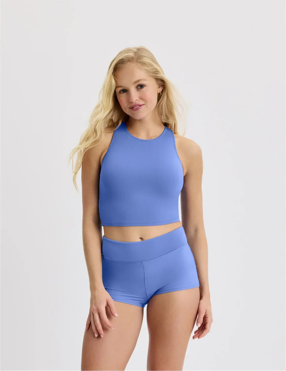 Front view of model wearing the Teen Racerback Tankini Swim Top highlighting the coverage and fit – Wave Pool – view 12 of 45