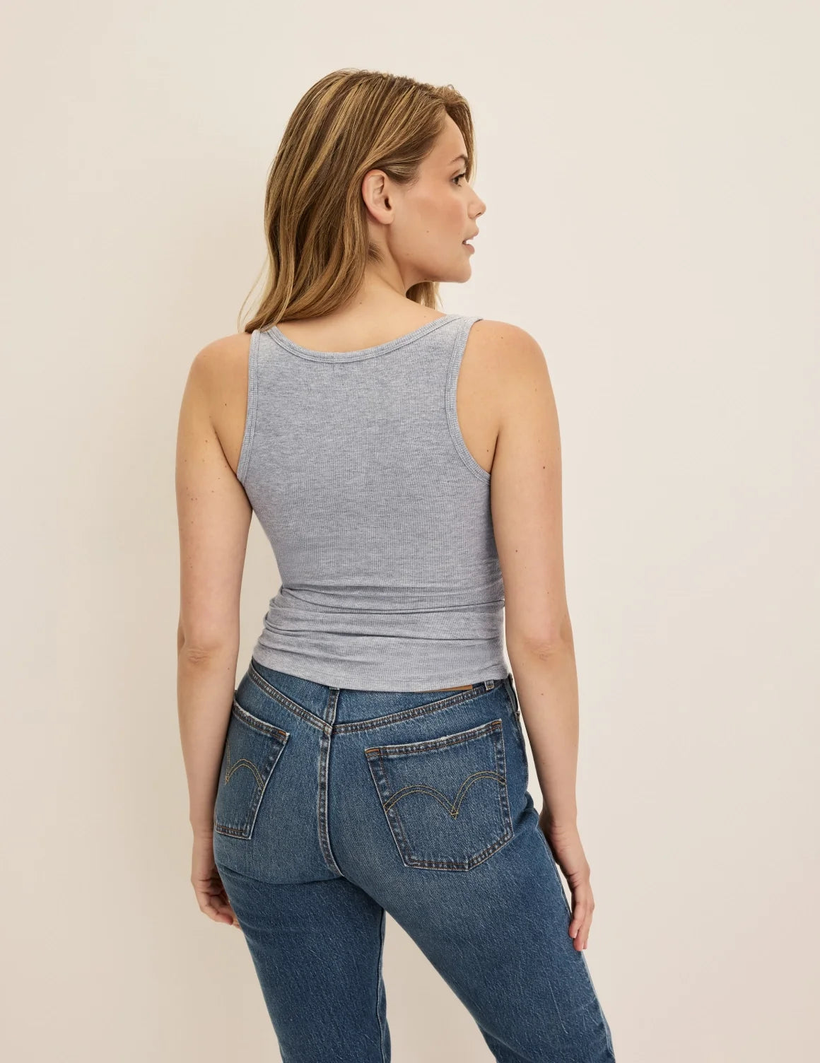 Back view of model wearing the Modal Rib Tank highlighting the coverage and fit – Heathered Grey – view 7 of 25