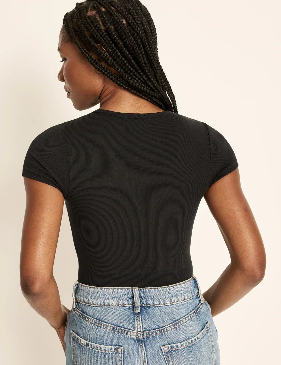 Back view of model wearing the SculptRib™ Cotton T-Shirt highlighting the neckline, fabric and hugging fit – Black – view 9 of 19