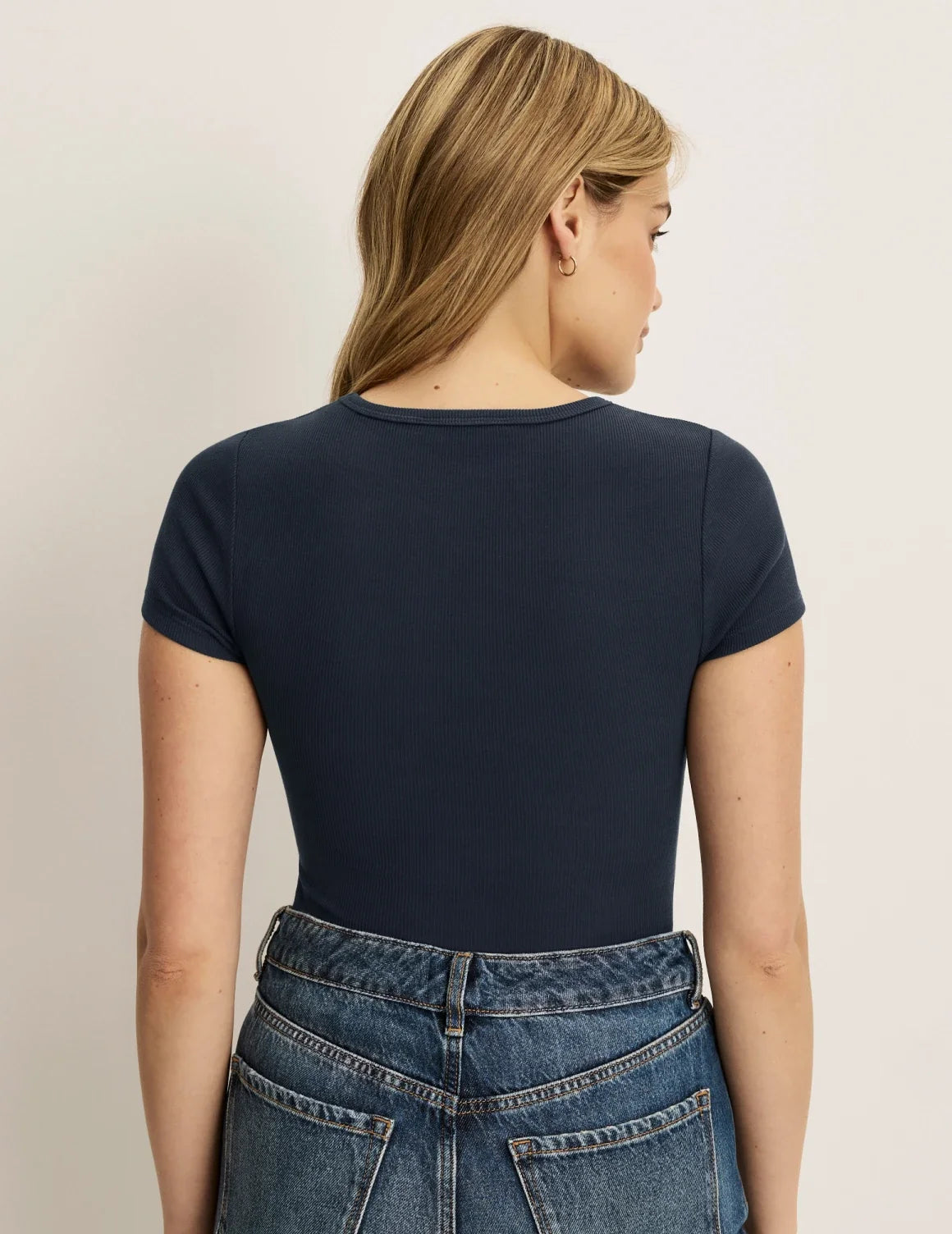 Back view of model wearing the SculptRib™ Cotton T-Shirt highlighting the neckline, fabric and hugging fit – Twilight Navy – view 12 of 19