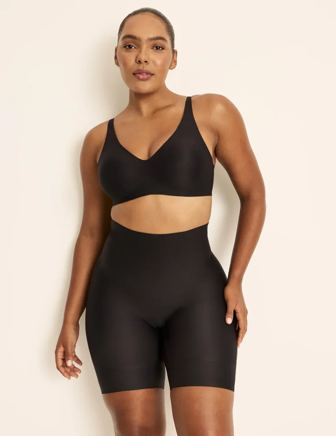 Front view of model wearing the Customizable Shaper High Rise Leakproof Shorts, highlighting the coverage and smooth fit – Black – view 2 of 18