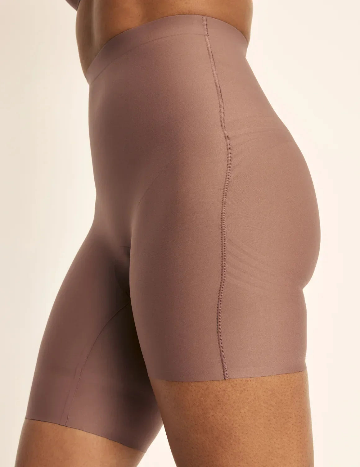 Side view of model wearing the Customizable Shaper High Rise Leakproof Shorts, highlighting the coverage and smooth fit – Sola – view 12 of 18
