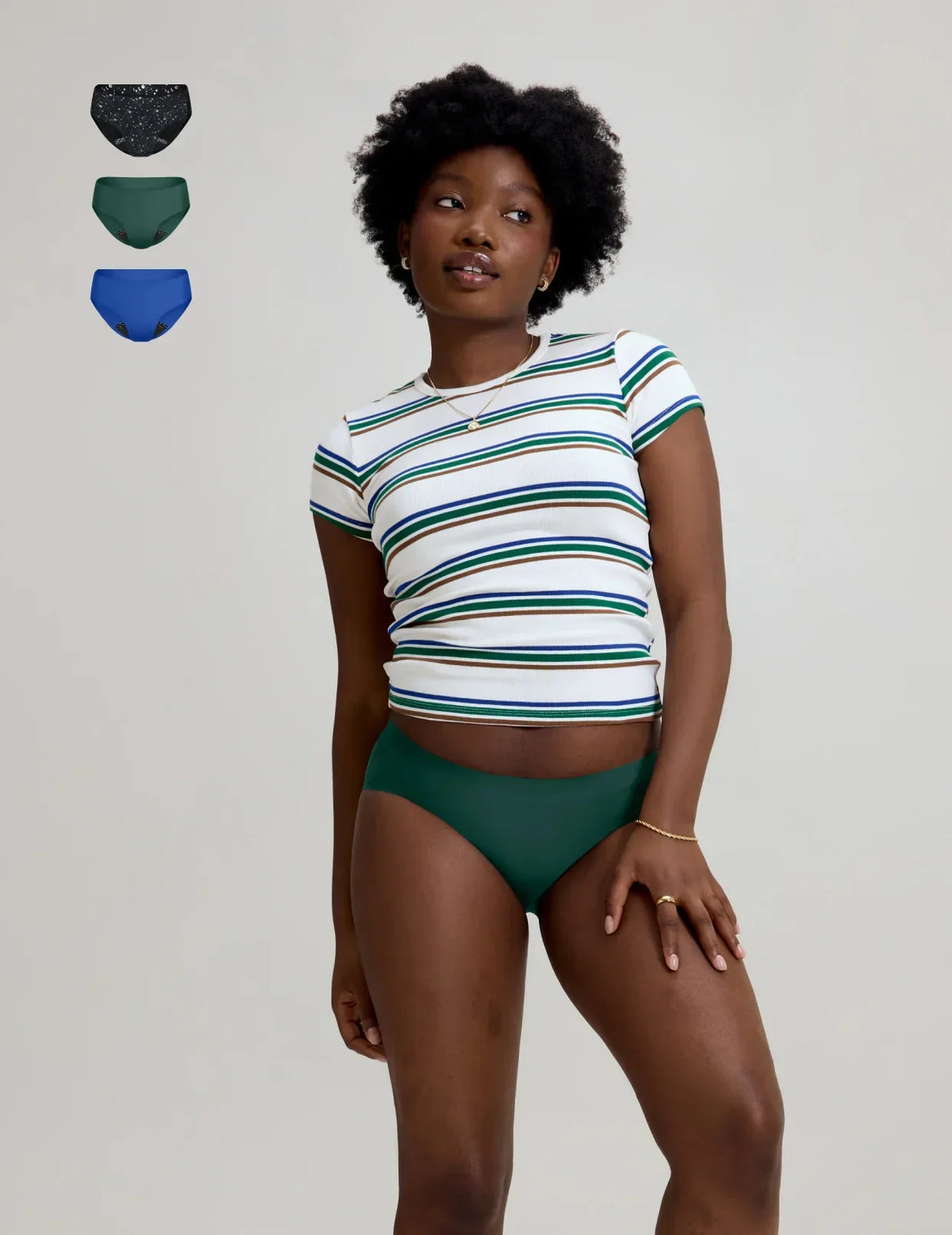 Front view of model wearing the Teen Leakproof UltraThin No-Show Bikini highlighting the coverage and smooth fit – Blueberry/Holly/Galaxy – view 3 of 70