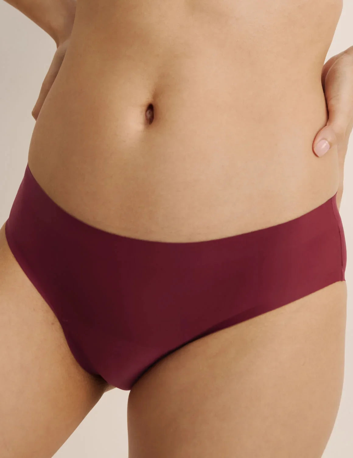 Front view of model wearing the Super Leakproof® No-Show Bikini highlighting the coverage and smooth fit – Dark Cherry – view 10 of 29