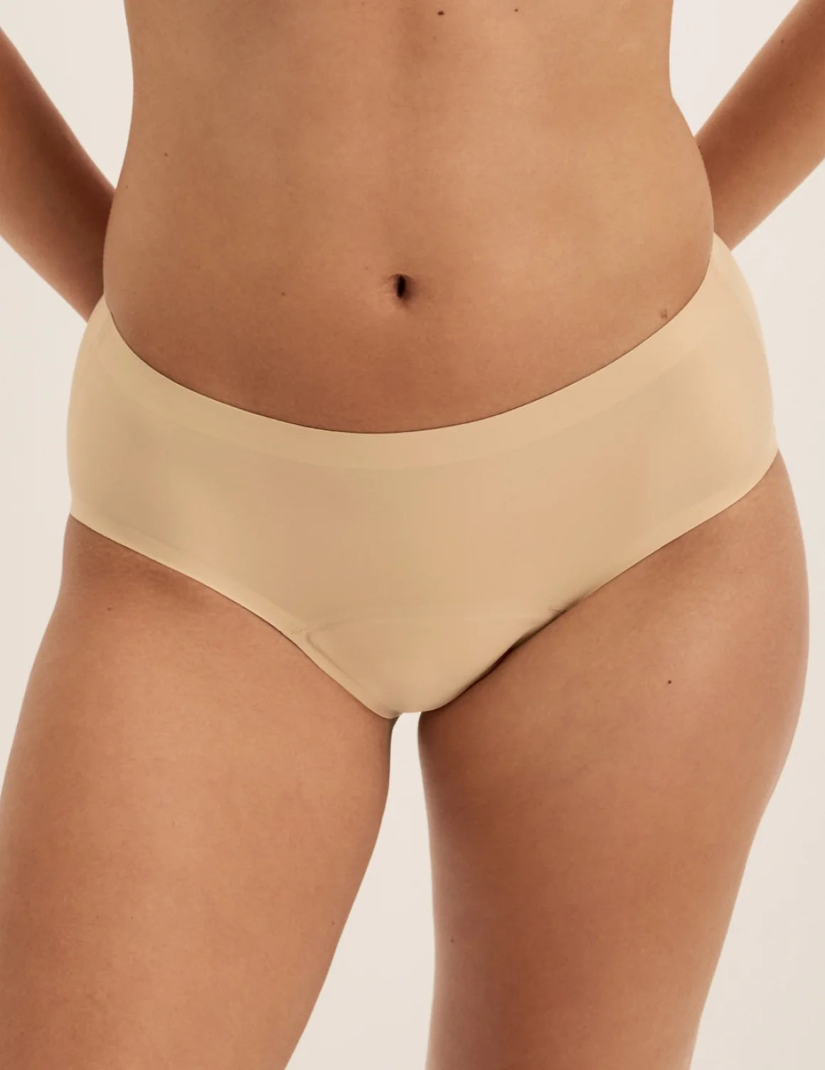Front view of model wearing the Super Leakproof® No-Show Boyshort highlighting the coverage and smooth fit – Warm Sand – view 7 of 28