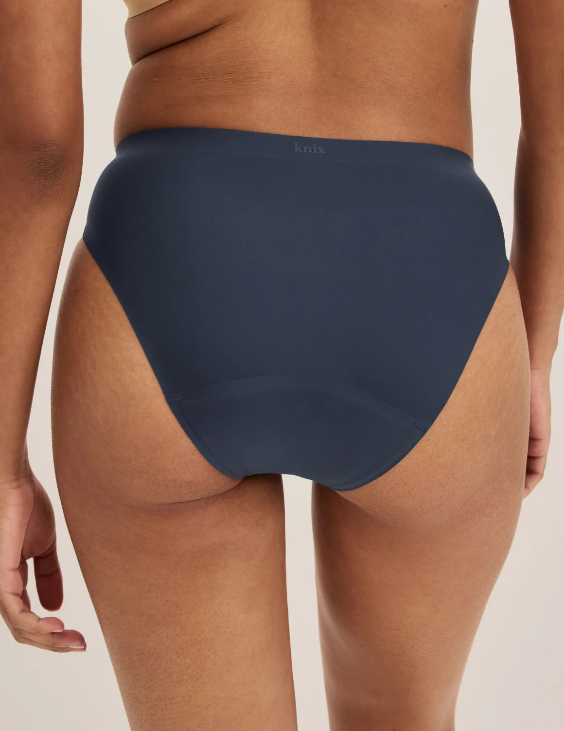 Back view of model wearing the Super Leakproof® No-Show French Cut highlighting the coverage and smooth fit – Twilight Navy – view 6 of 27