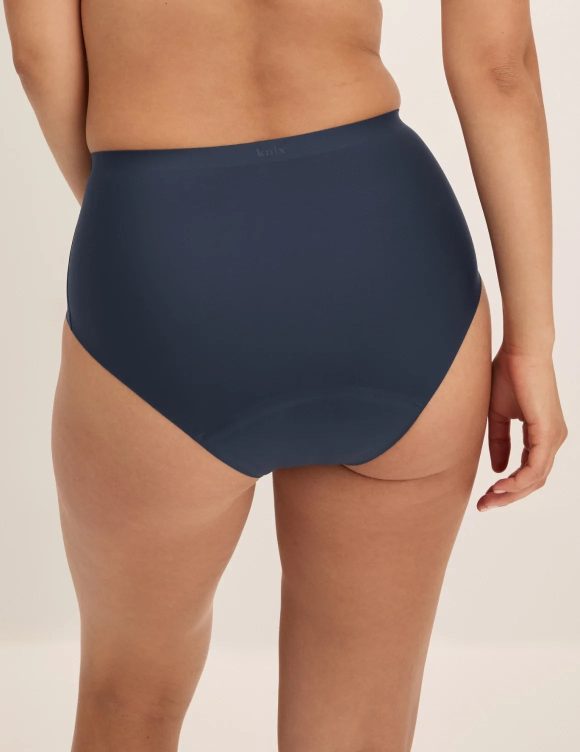 Back view of model wearing the Super Leakproof® No-Show High Rise highlighting the coverage and smooth fit – Twilight Navy – view 6 of 27