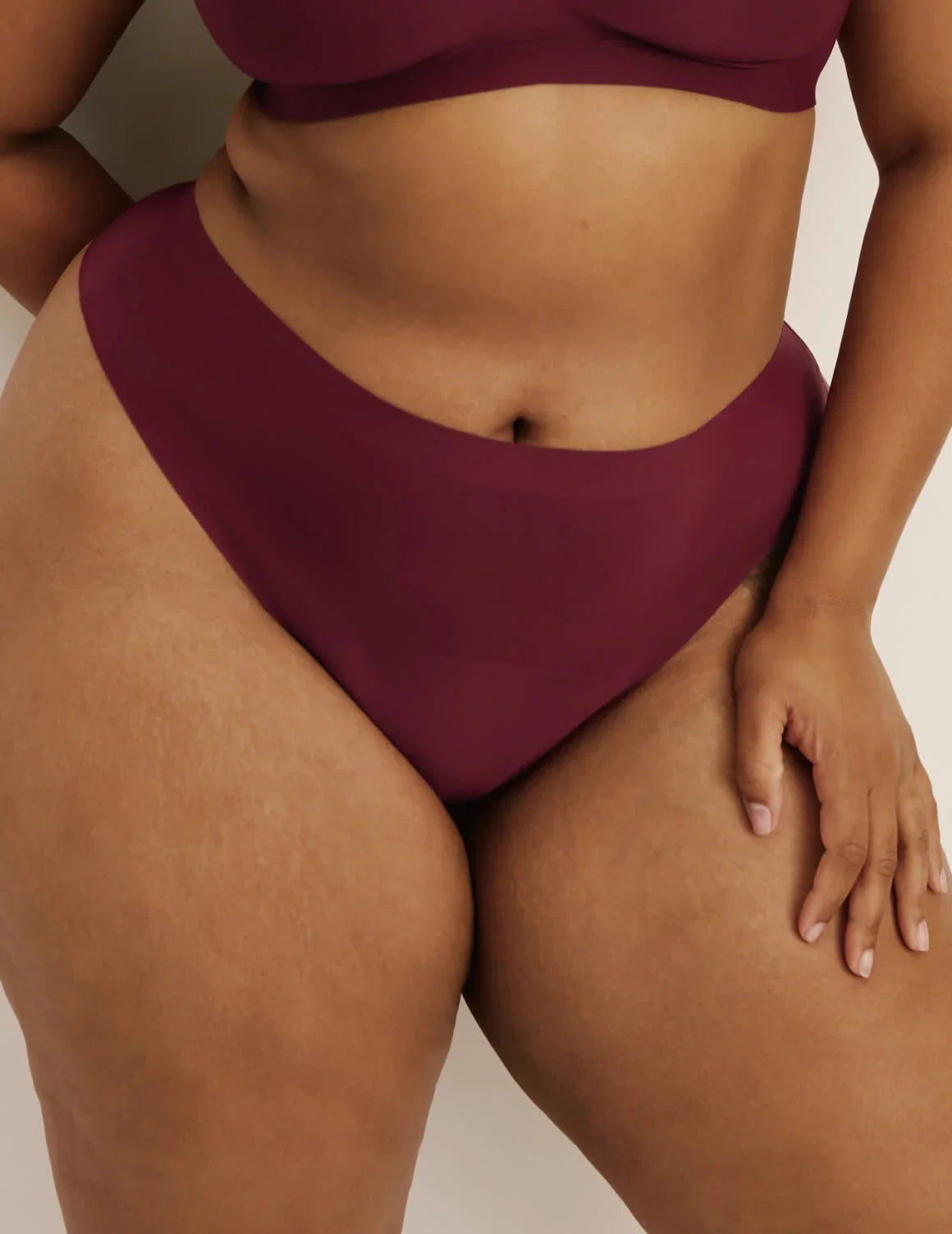 Front view of model wearing the Super Leakproof® No-Show Thong highlighting the coverage and smooth fit – Dark Cherry – view 10 of 28