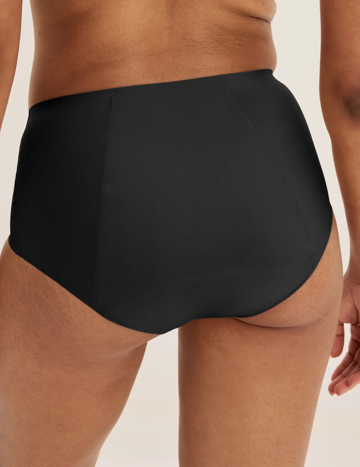 Back view of model wearing the SuperPlus Leakproof® No-Show Boybrief highlighting the coverage and smooth fit – Black – view 3 of 17